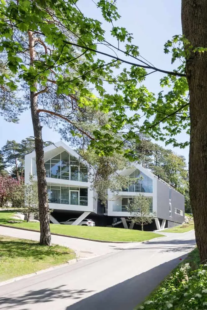 Two-Story House by ArchLAB Studio: Cozy Retreat Amidst Pine Forests in Vilnius