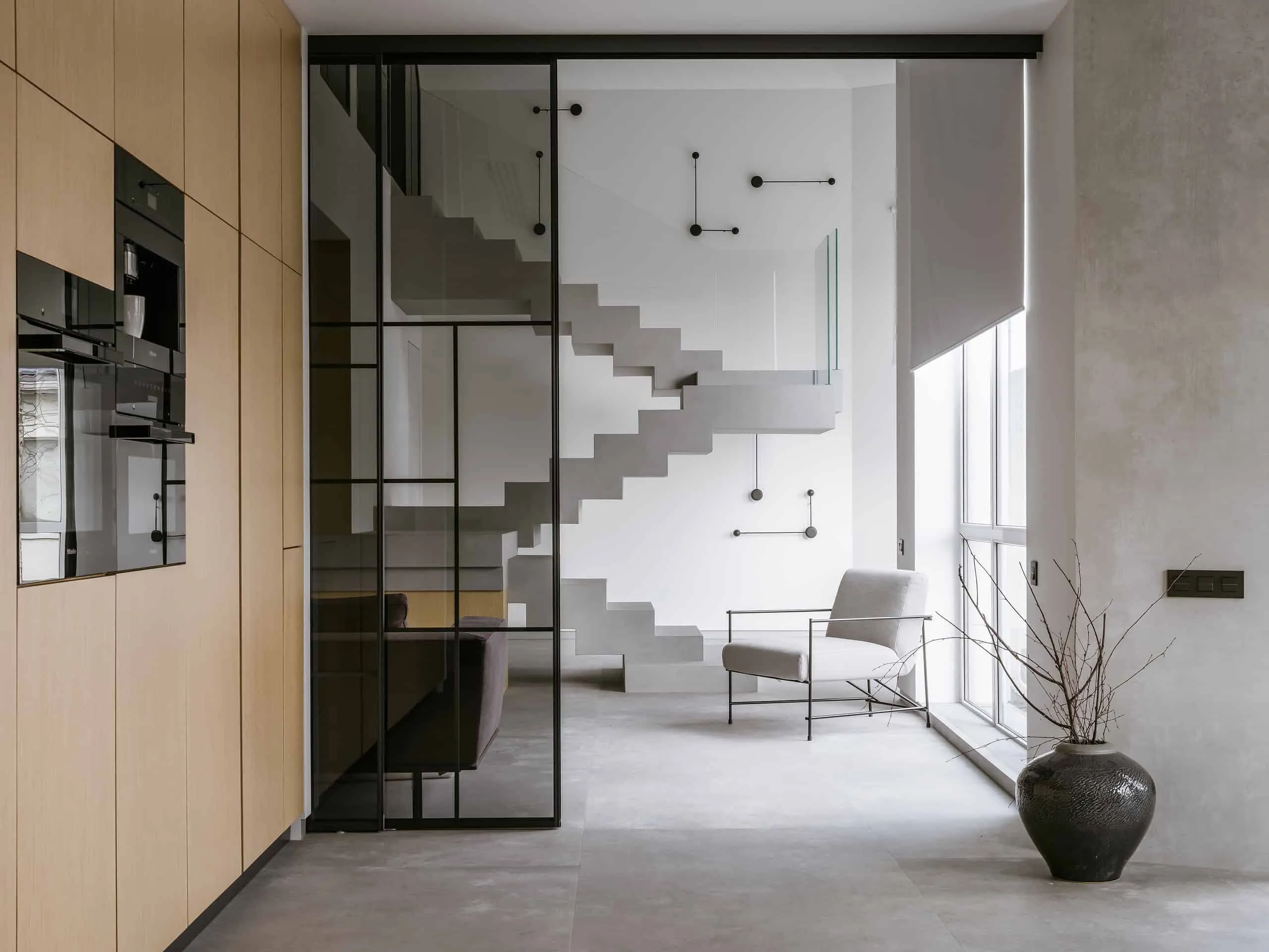 House with Flying Staircase: Minimalist Renovation by Makedesign Studio