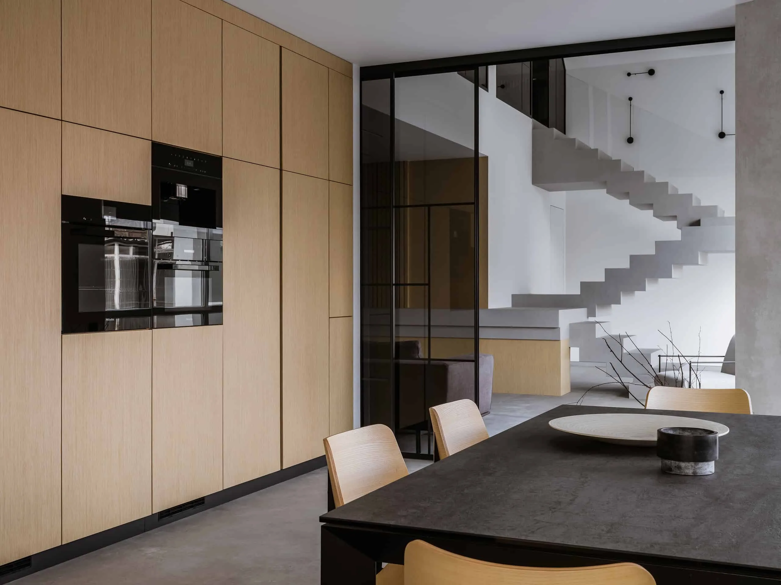 House with Flying Staircase: Minimalist Renovation by Makedesign Studio