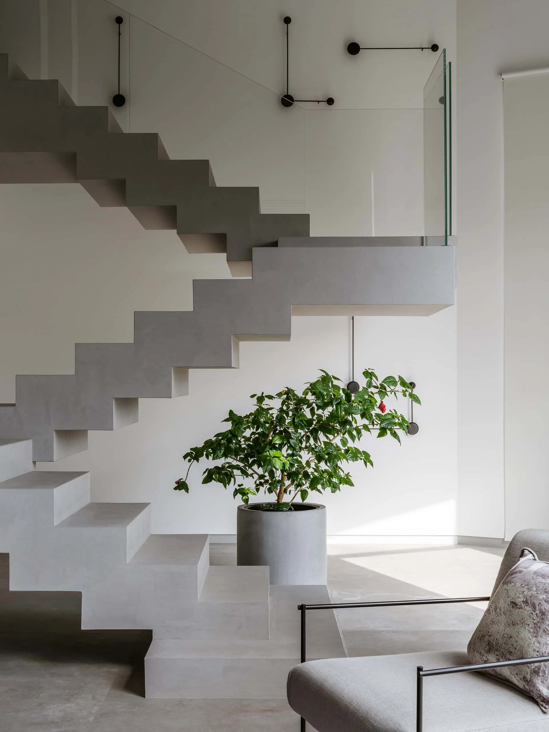 House with Flying Staircase: Minimalist Renovation by Makedesign Studio