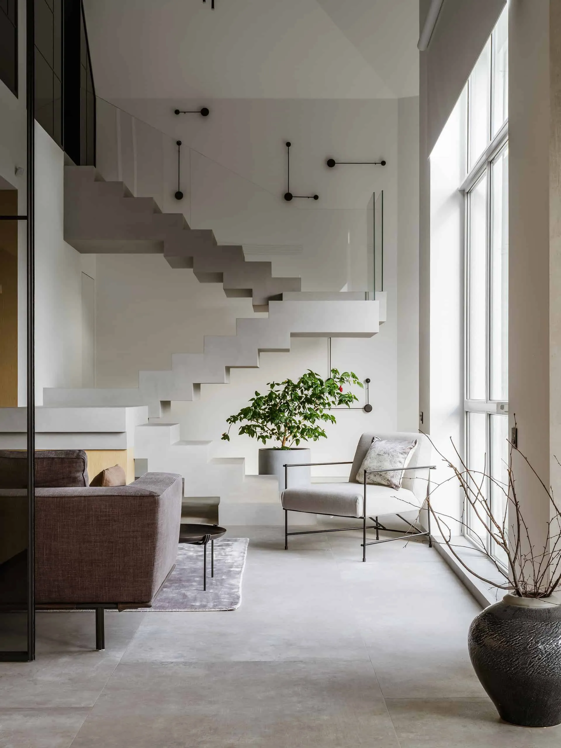 House with Flying Staircase: Minimalist Renovation by Makedesign Studio