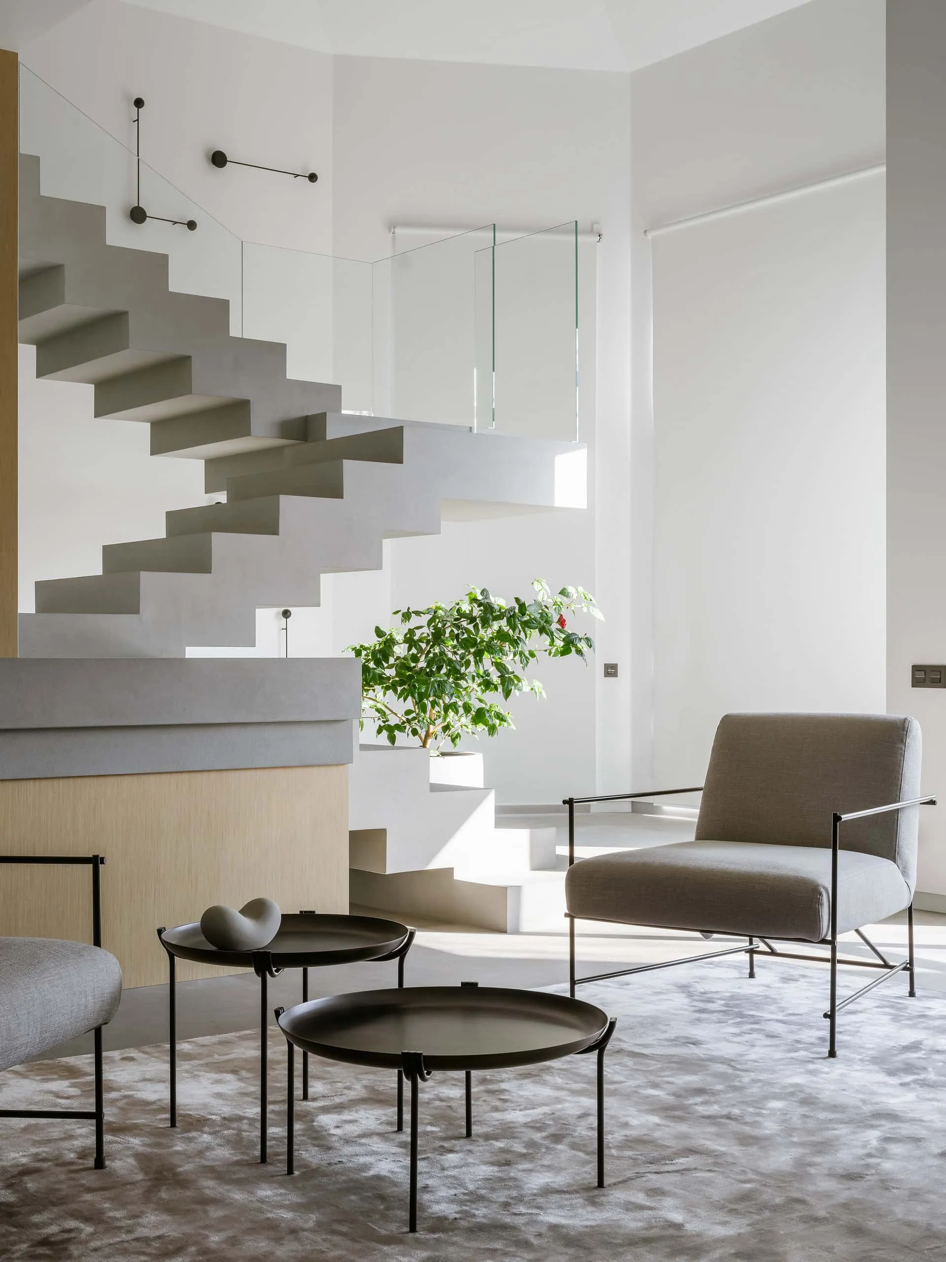 House with Flying Staircase: Minimalist Renovation by Makedesign Studio