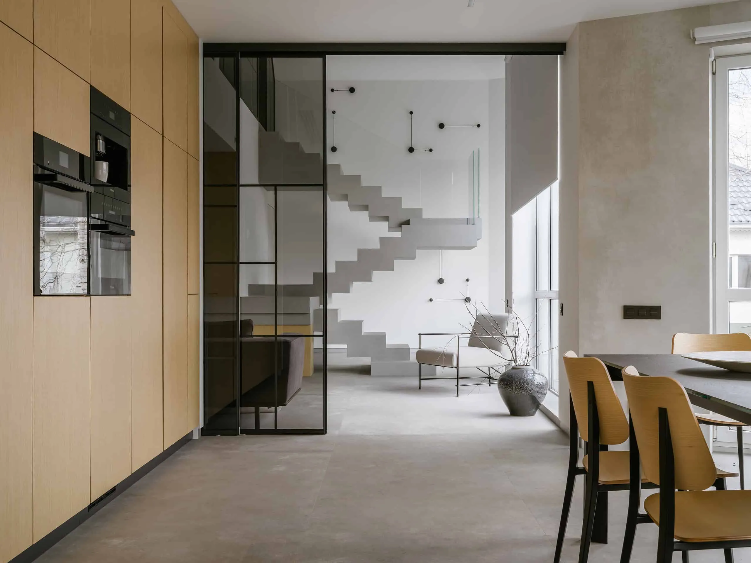 House with Flying Staircase: Minimalist Renovation by Makedesign Studio