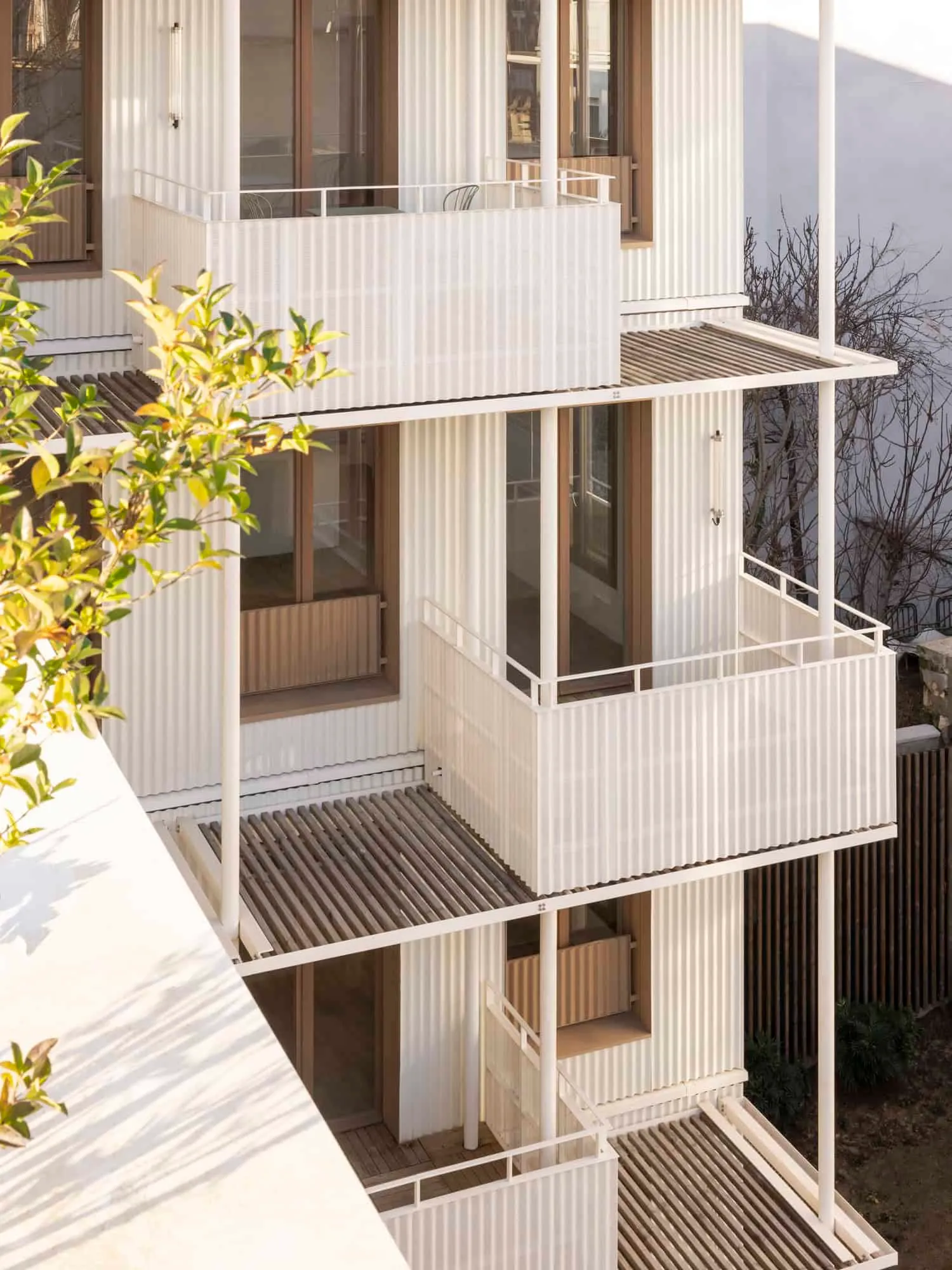 Glass balconies on the garden side of the building