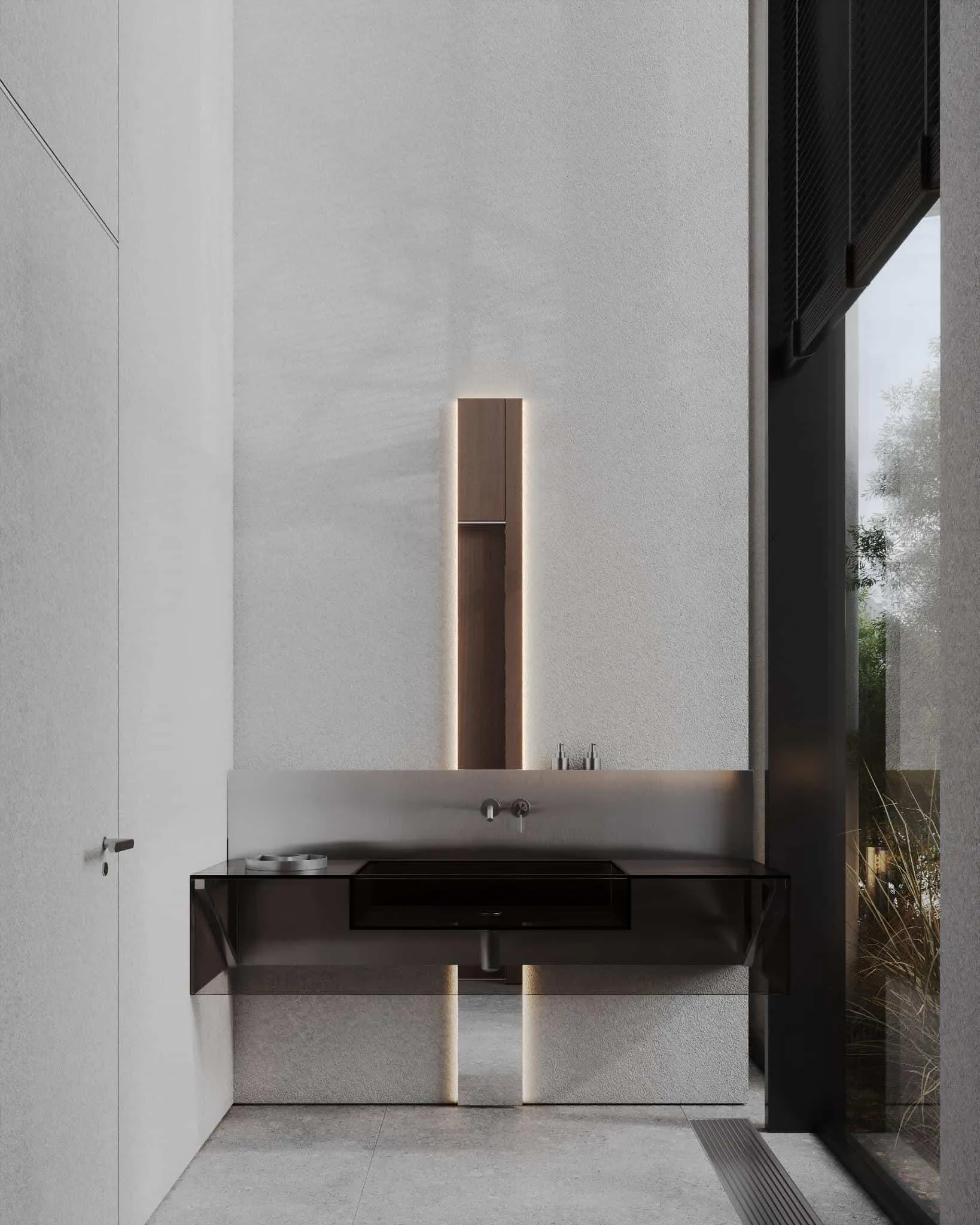 极简浴室配有浮动不锈钢洗手池和垂直照明镜子。