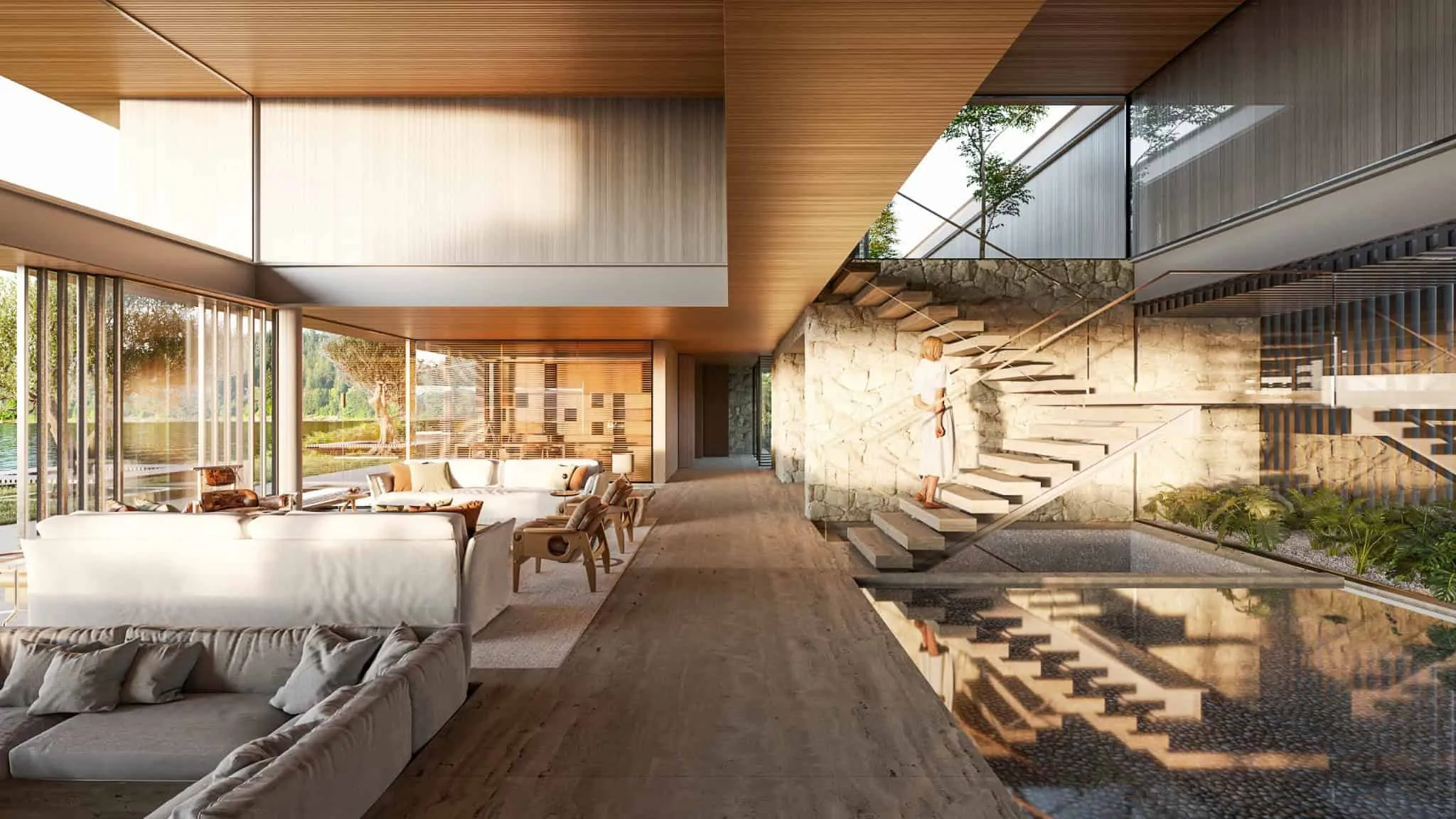 Modern interior with floating staircase and textured stone wall.