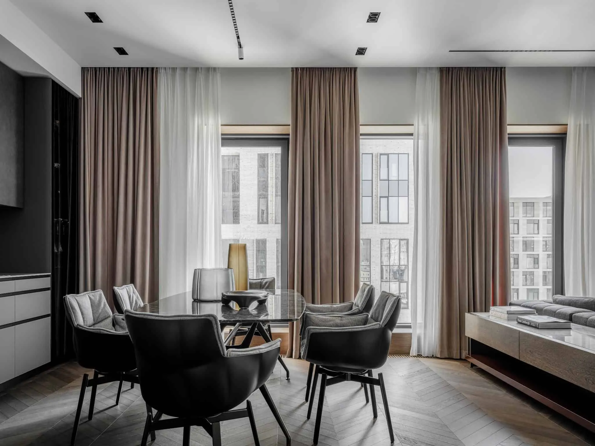 Sunlit dining area with modern furniture.