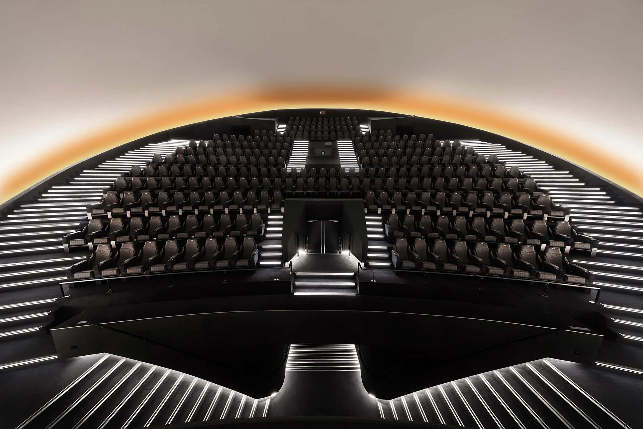 Full view of the theater with seats inside La Géode.