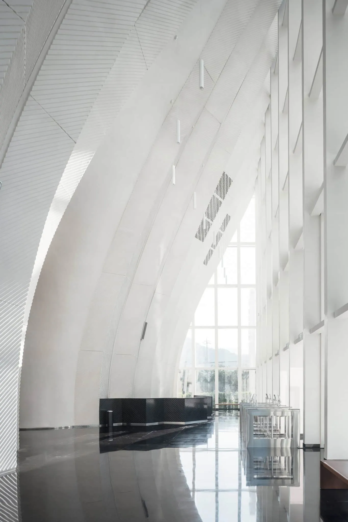 Light and shadow in Sunner Museum lobby Play of light and shadow on curved white interior walls of Sunner Museum