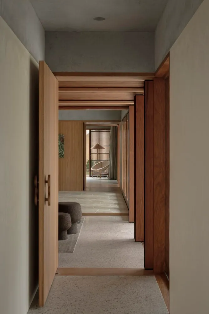 Elegant hall with natural wood tones and ornate doors in Newcastle