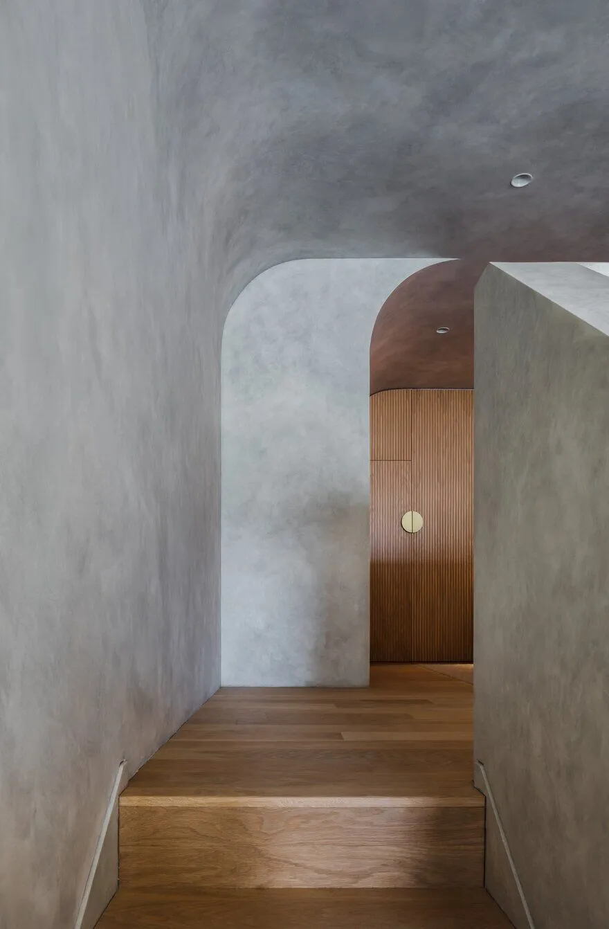 Marble countertop with organic sculptural elements in a brutal kitchen