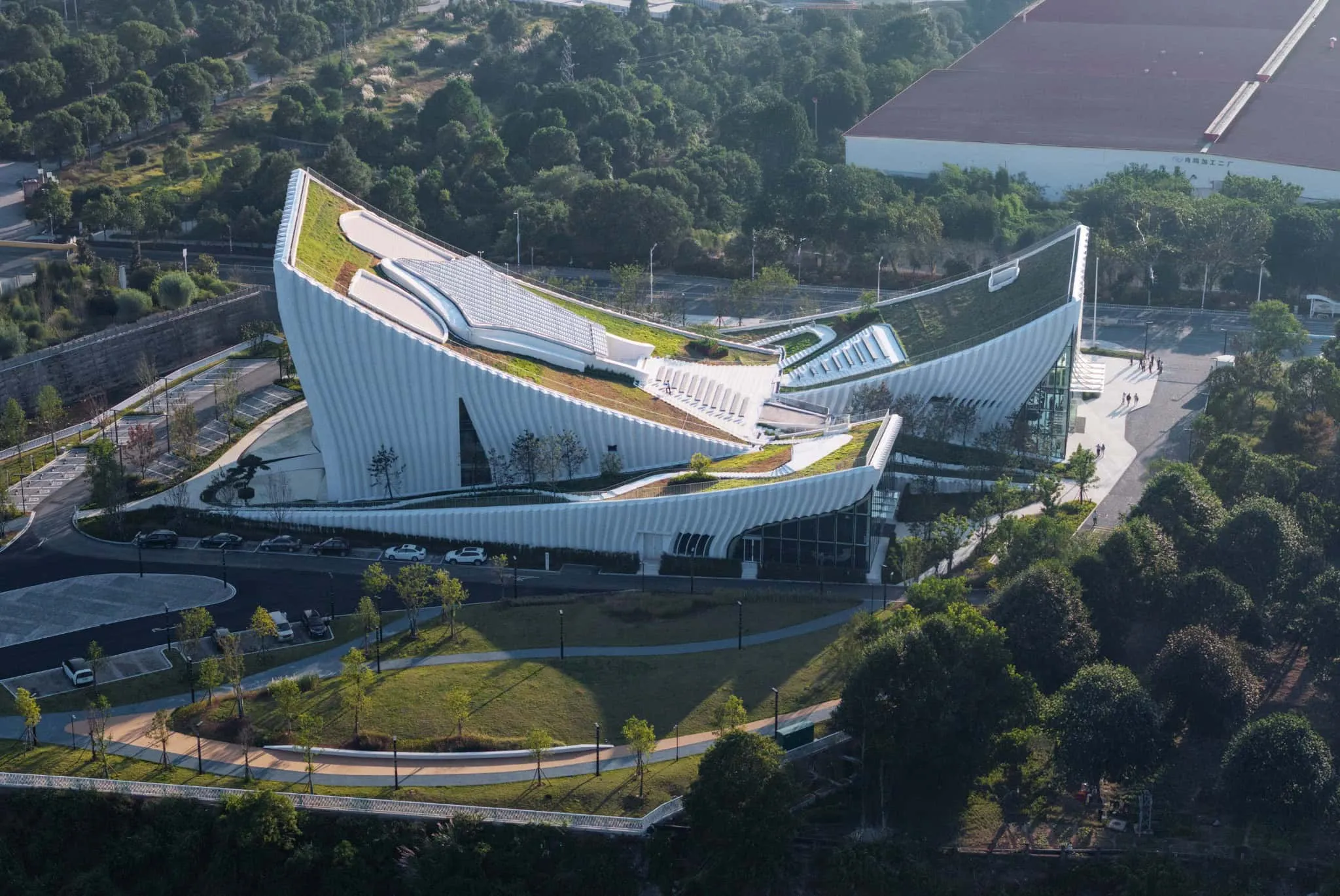 Aerial view of Sunner Museum with green roofs Aerial view of Sunner Museum showing solar panels and green roof design