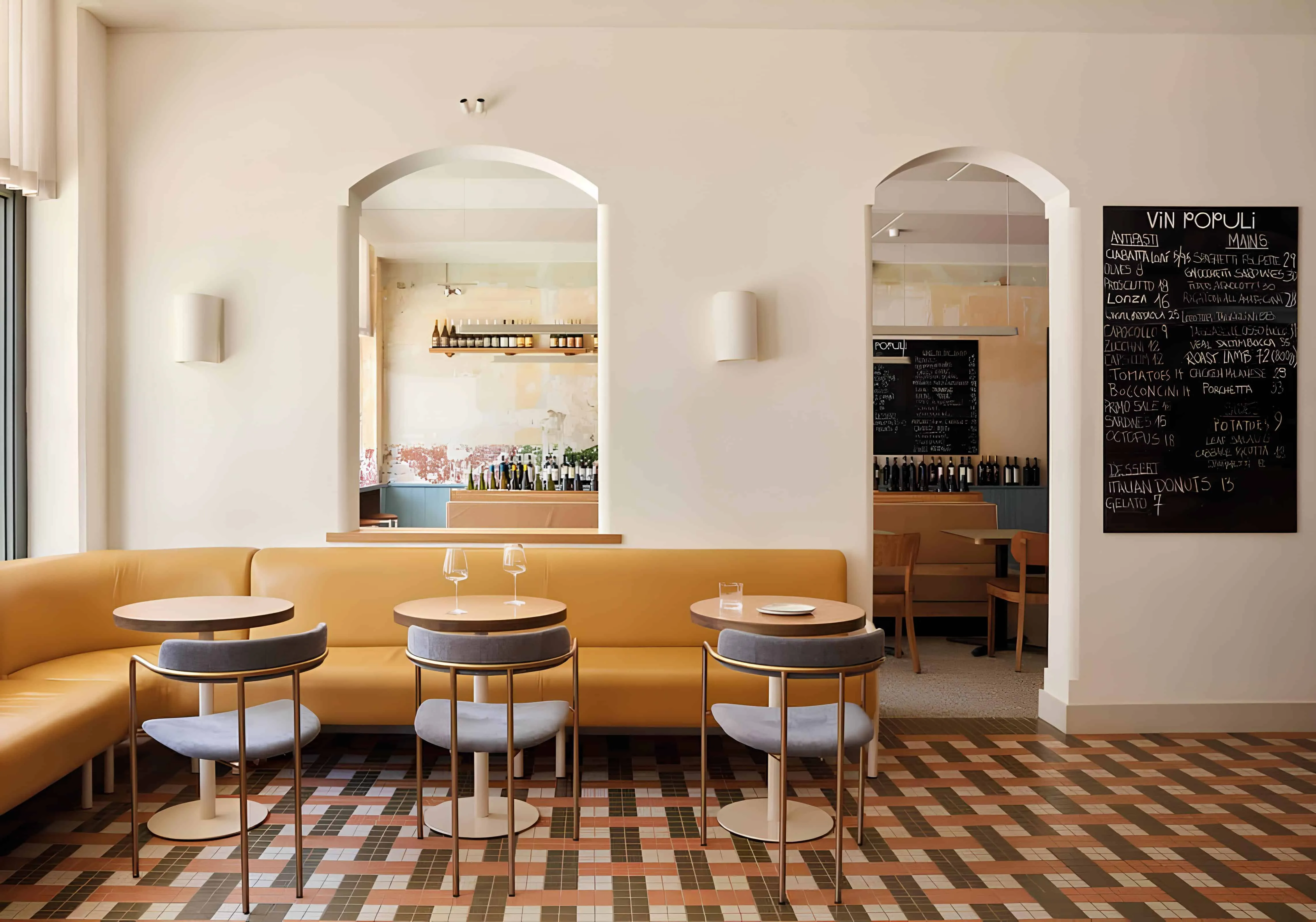 Interior view of Vin Populi restaurant in Fremantle, featuring soft arches and mustang leather seating