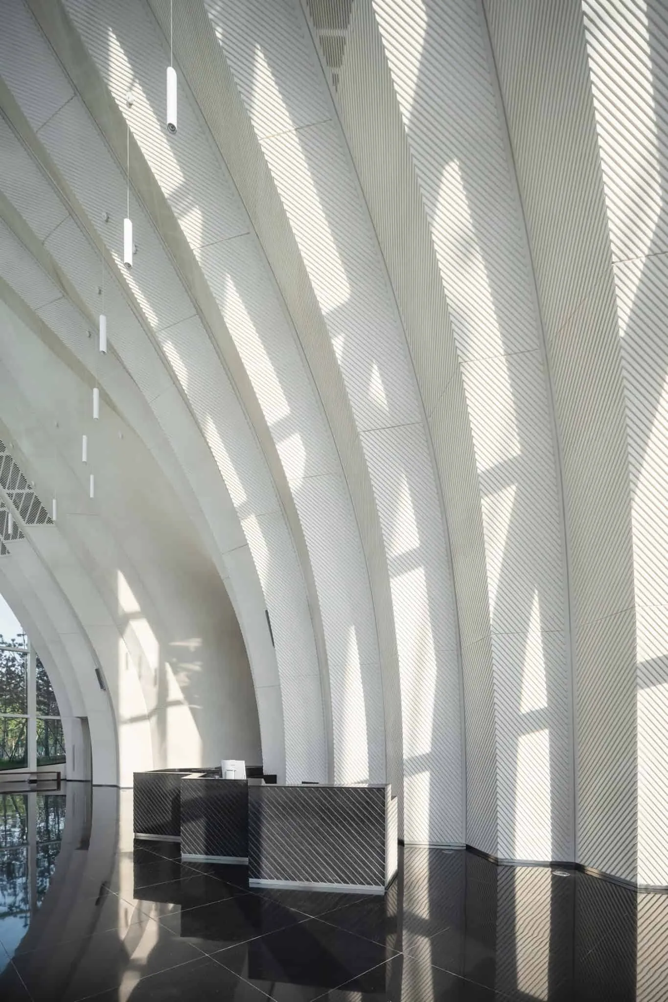 Interior lobby of Sunner Museum with curved walls Interior lobby of Sunner Museum with curved walls and glossy floor