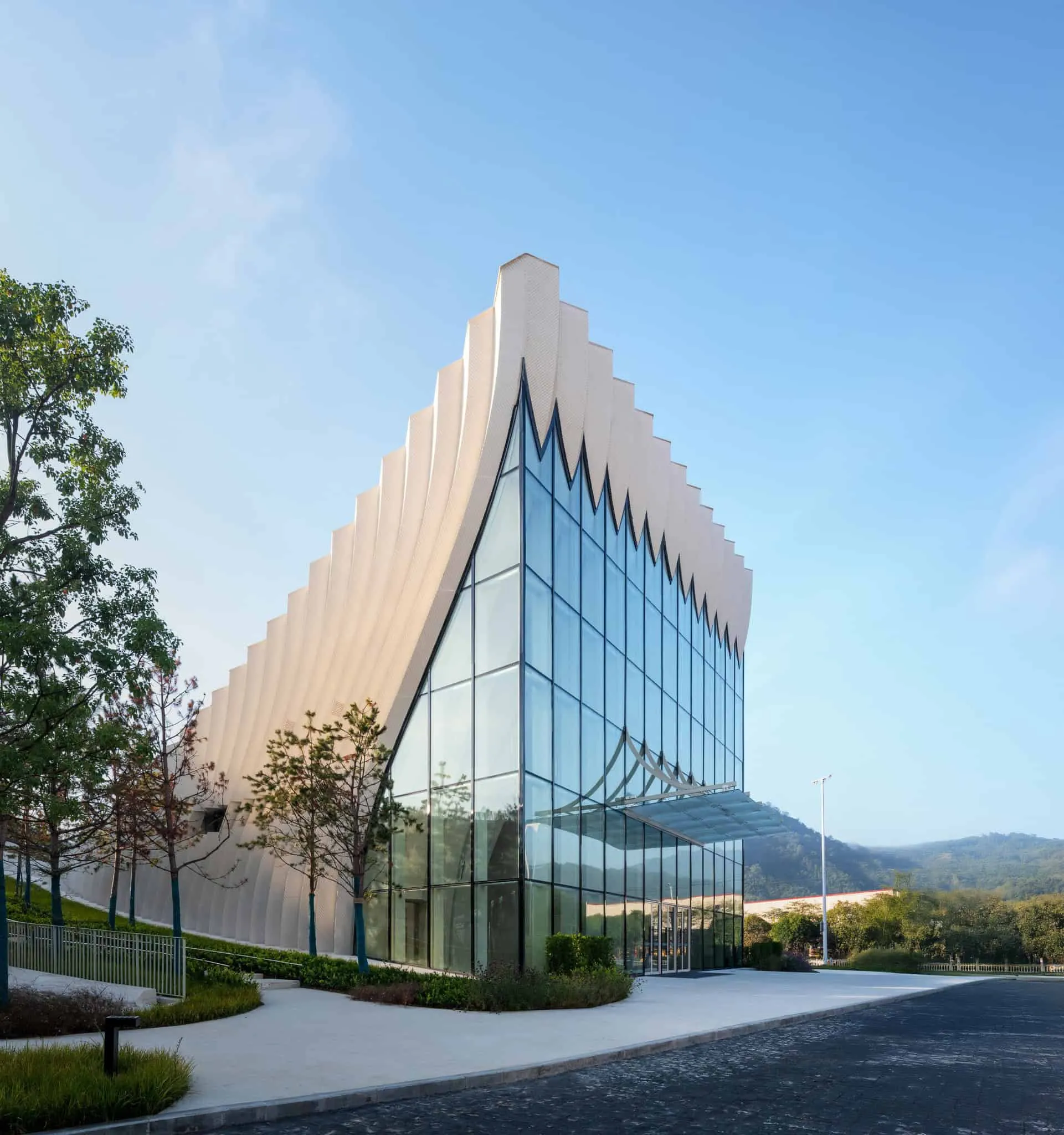 Sunner Museum entrance in morning Main entrance of Sunner Museum with morning light and glass facade