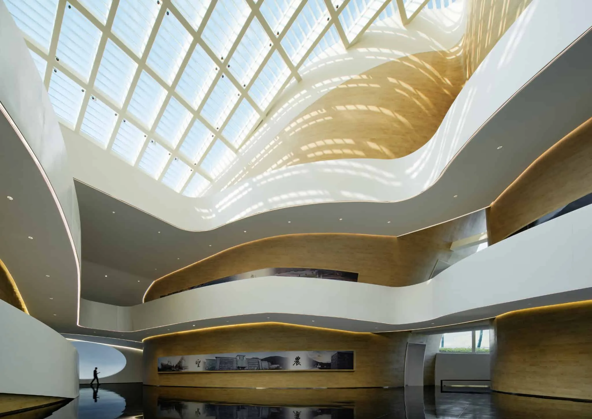Curved balconies of Sunner Museum atrium Curved balconies and stairs inside the central atrium of Sunner Museum