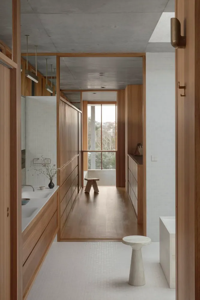 Elegant wooden hall leading to bathroom with garden view in Newcastle