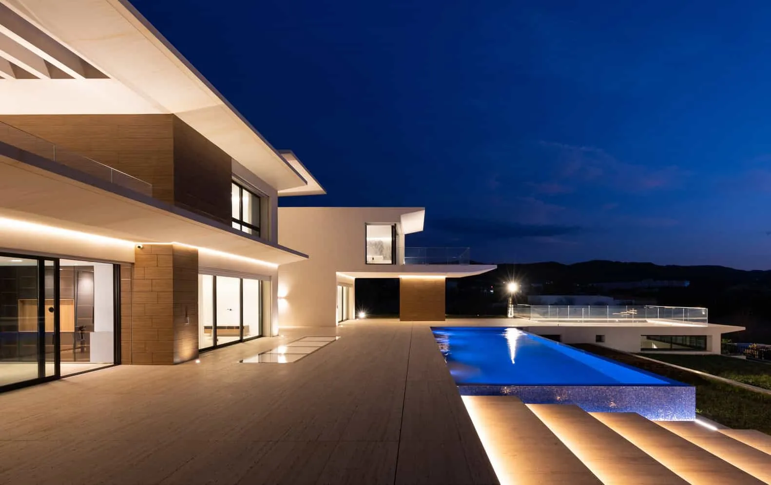 Detail of pool lighting on Villa Air under blue evening sky