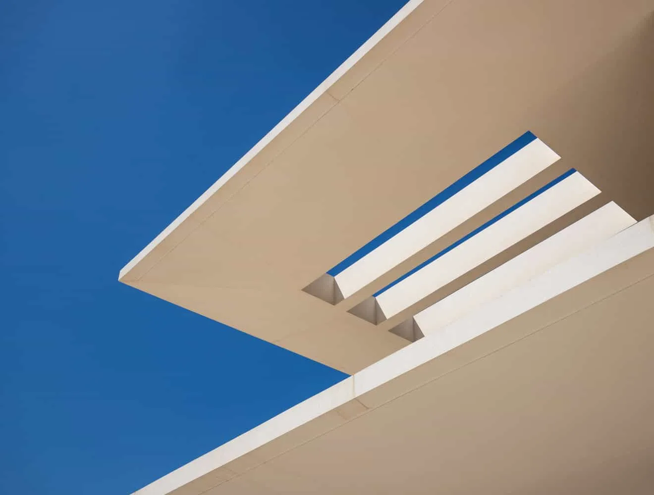 Curved staircase into the pool with ceramic tiles