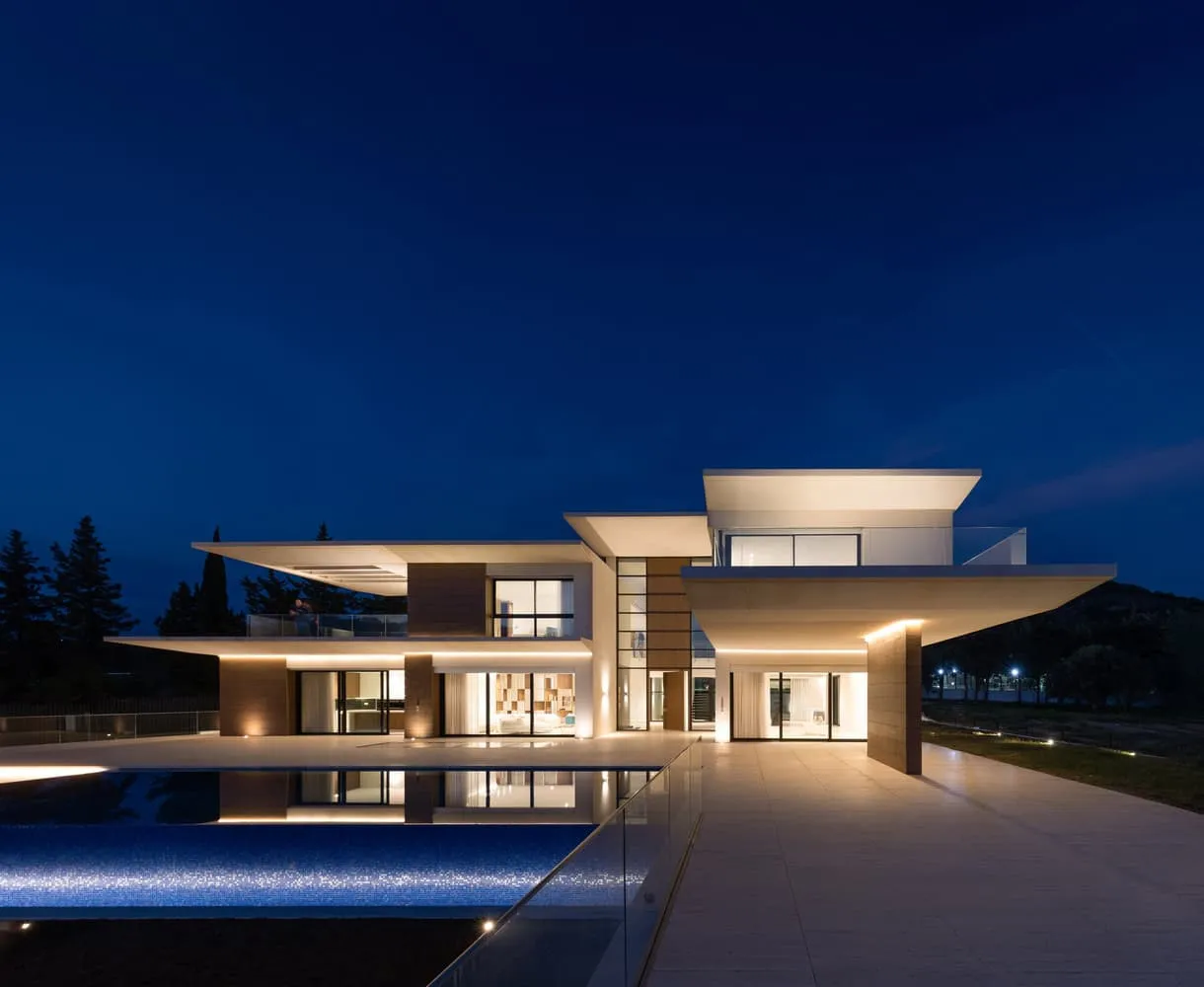 Daytime view of extended terrace and geometric pool design in Villa Air