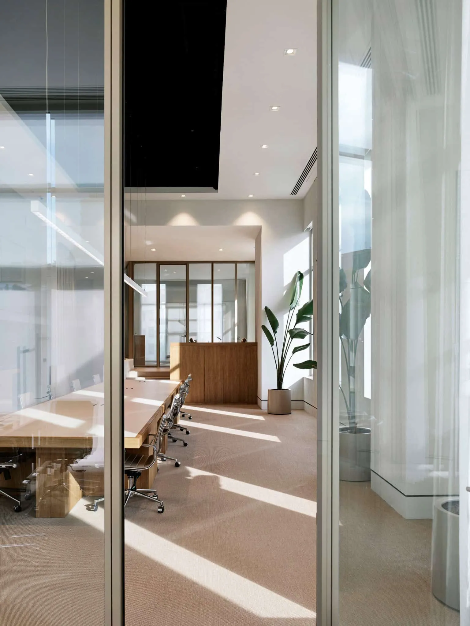 Executive table with glossy wood texture in Özlenir Headquarter