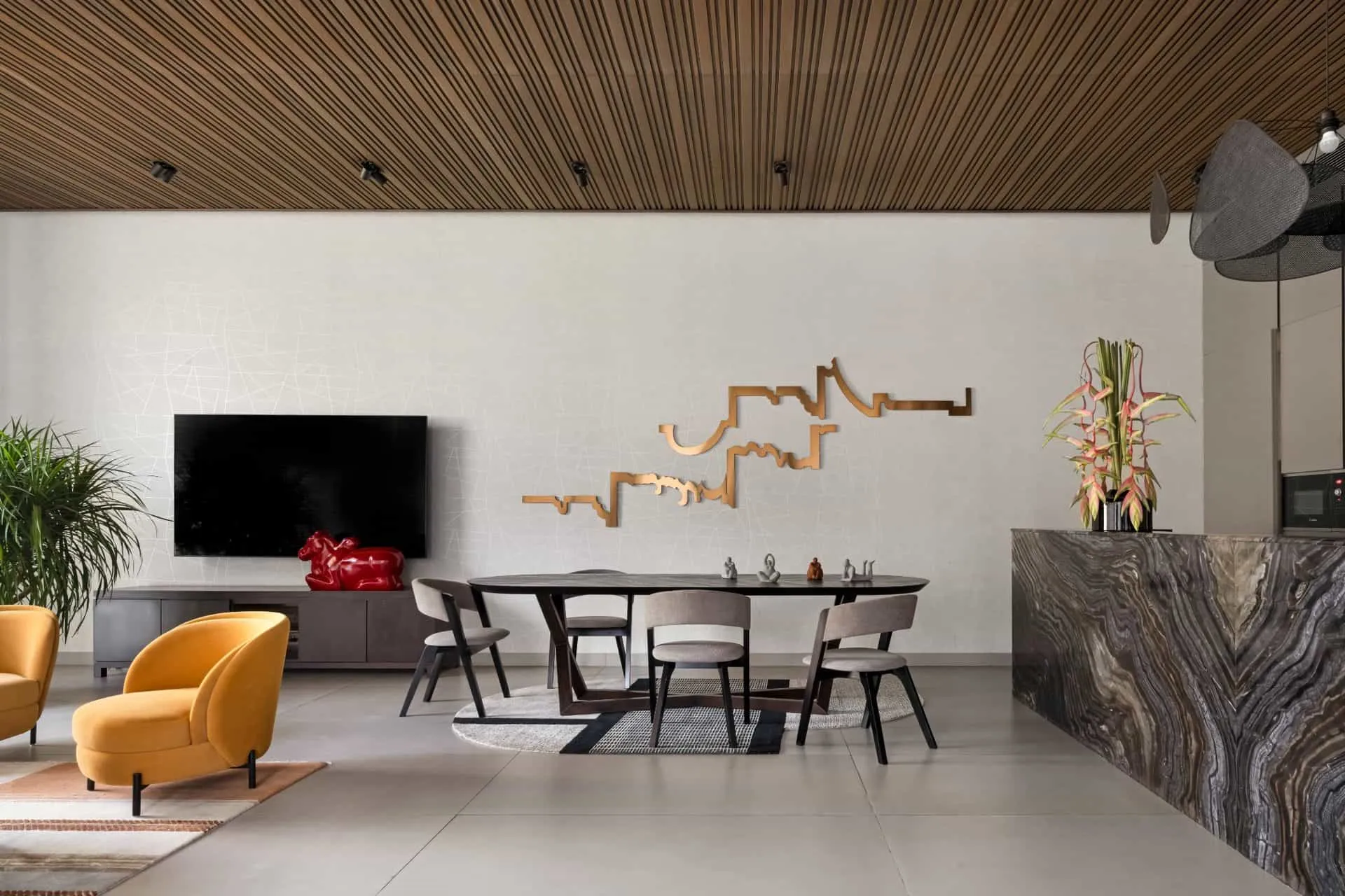 Wide view of the dining area wall in UrbanMistrii's Pool House in Chatarpur, Delhi.