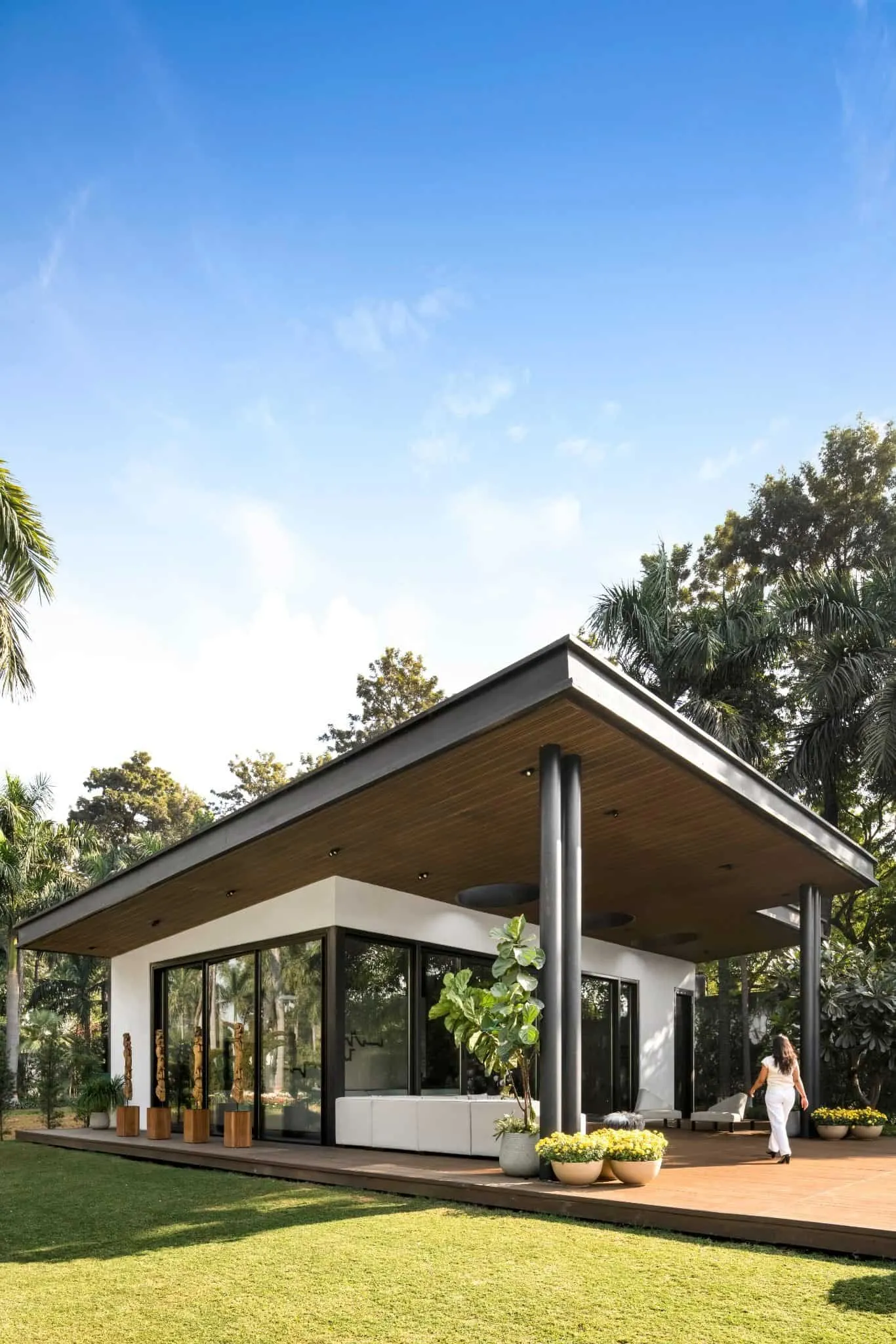 Exterior view of UrbanMistrii's Pool House in Chatarpur, Delhi.