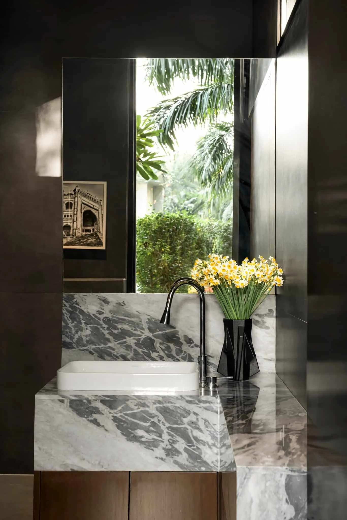 Bathroom in UrbanMistrii's Pool House in Chatarpur, Delhi.