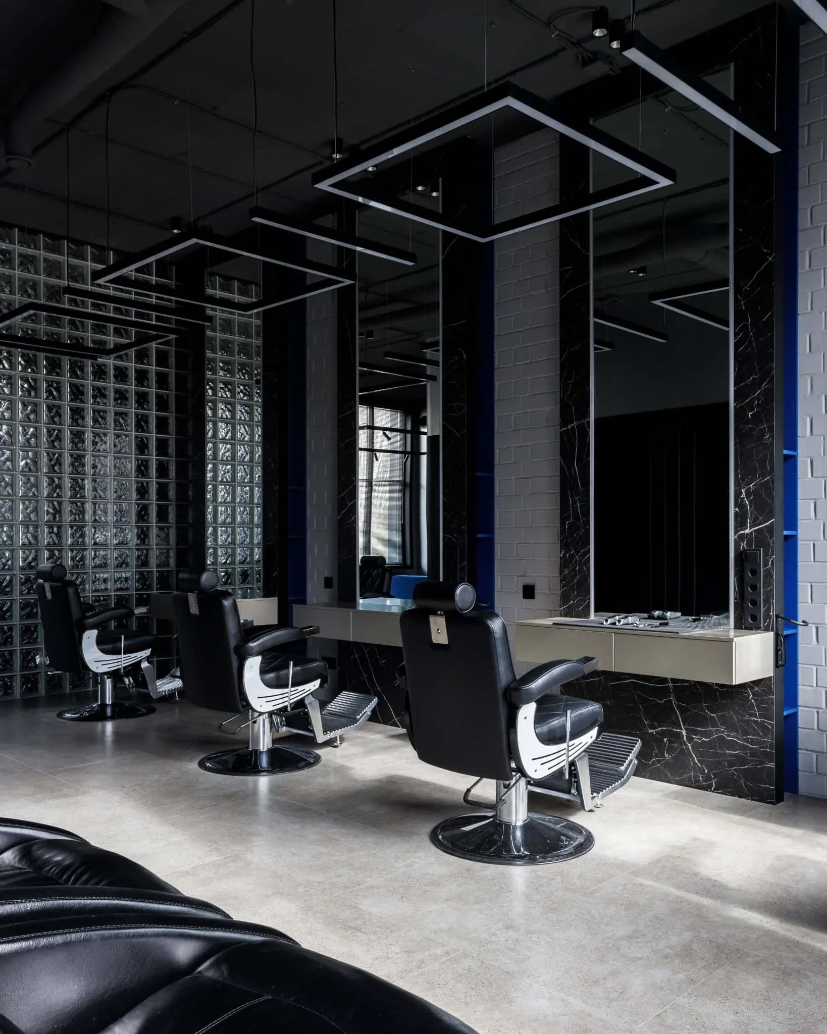 Modern minimalist interior by Julia Starikova – row of hair styling stations in Chelyabinsk, Russia