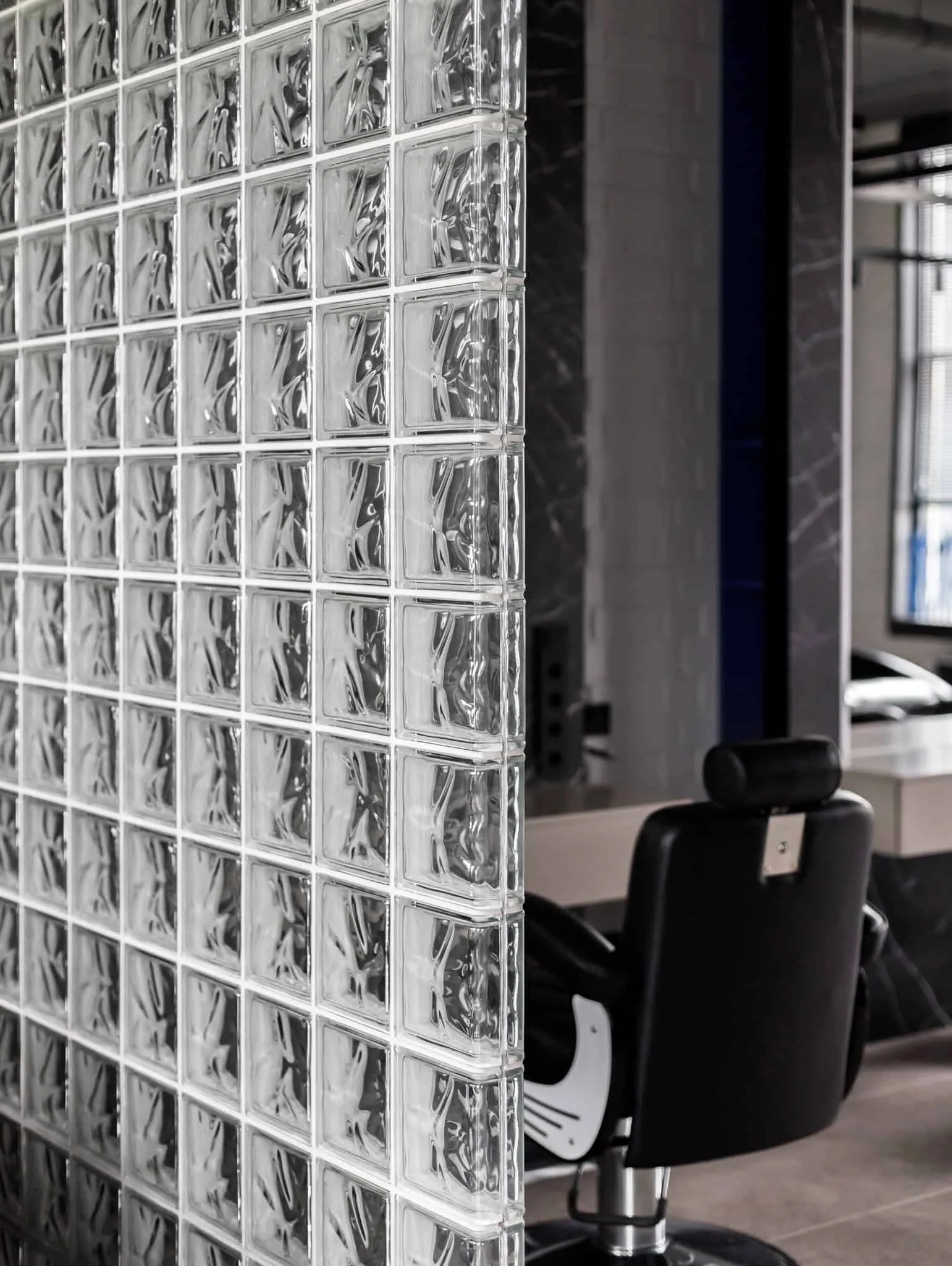 Modern minimalist interior by Julia Starikova – glass partition with chair in Chelyabinsk, Russia