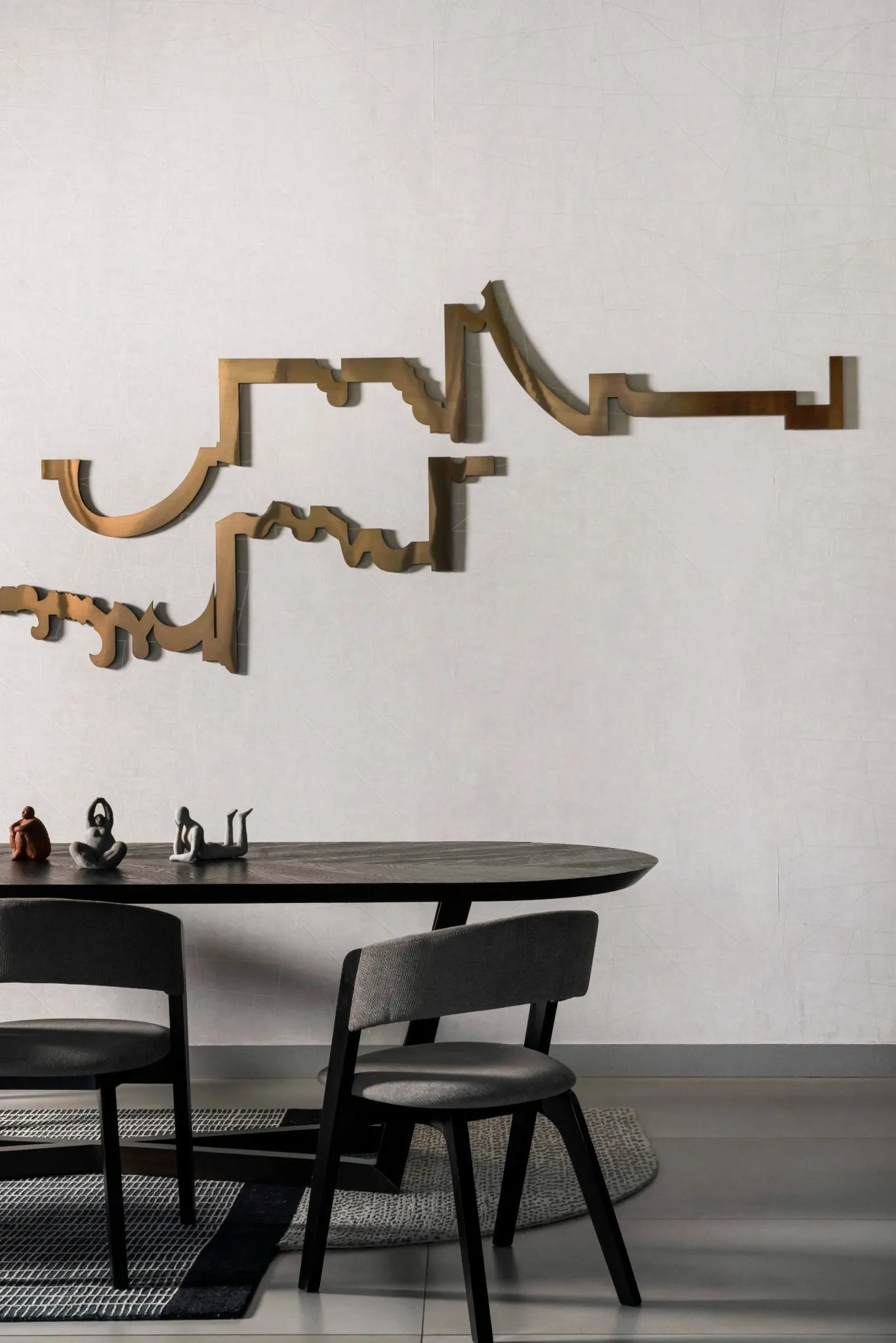 Wall details with art in the dining area of UrbanMistrii's Pool House – Chatarpur, Delhi