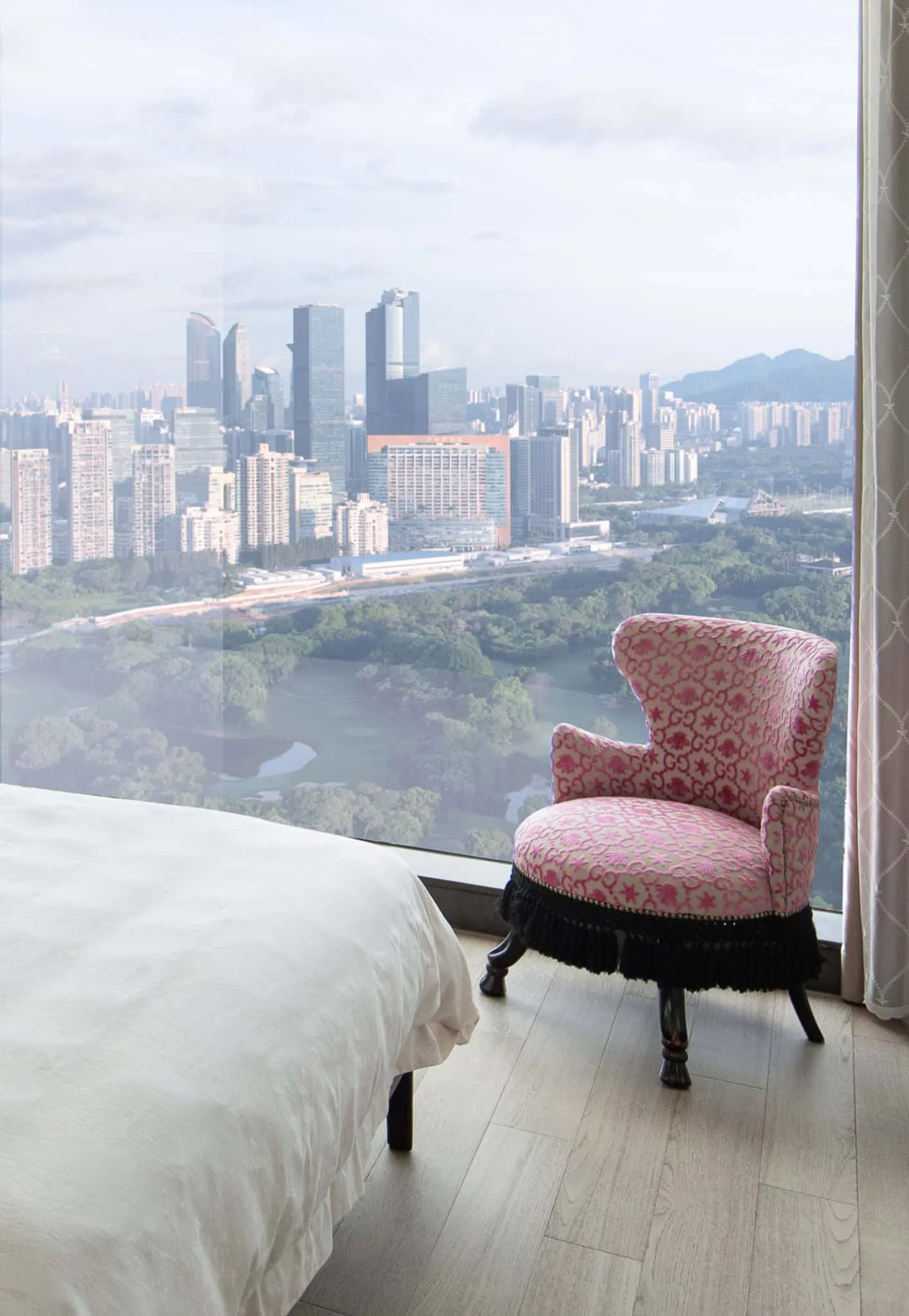 Azure Heights by BDSD Boundless Design – pink chair by window, Shenzhen, China