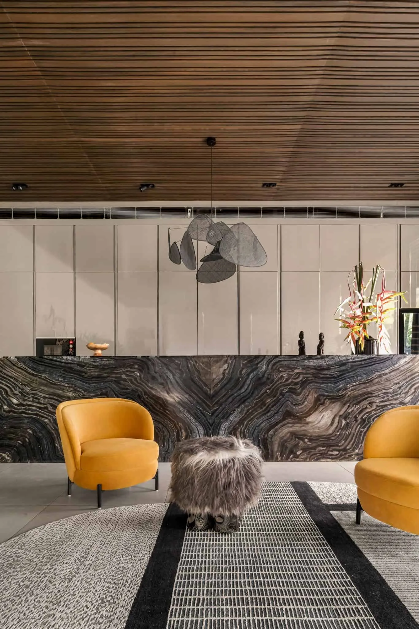 Portrait of the bar lounge area in UrbanMistrii's Pool House – Chatarpur, Delhi