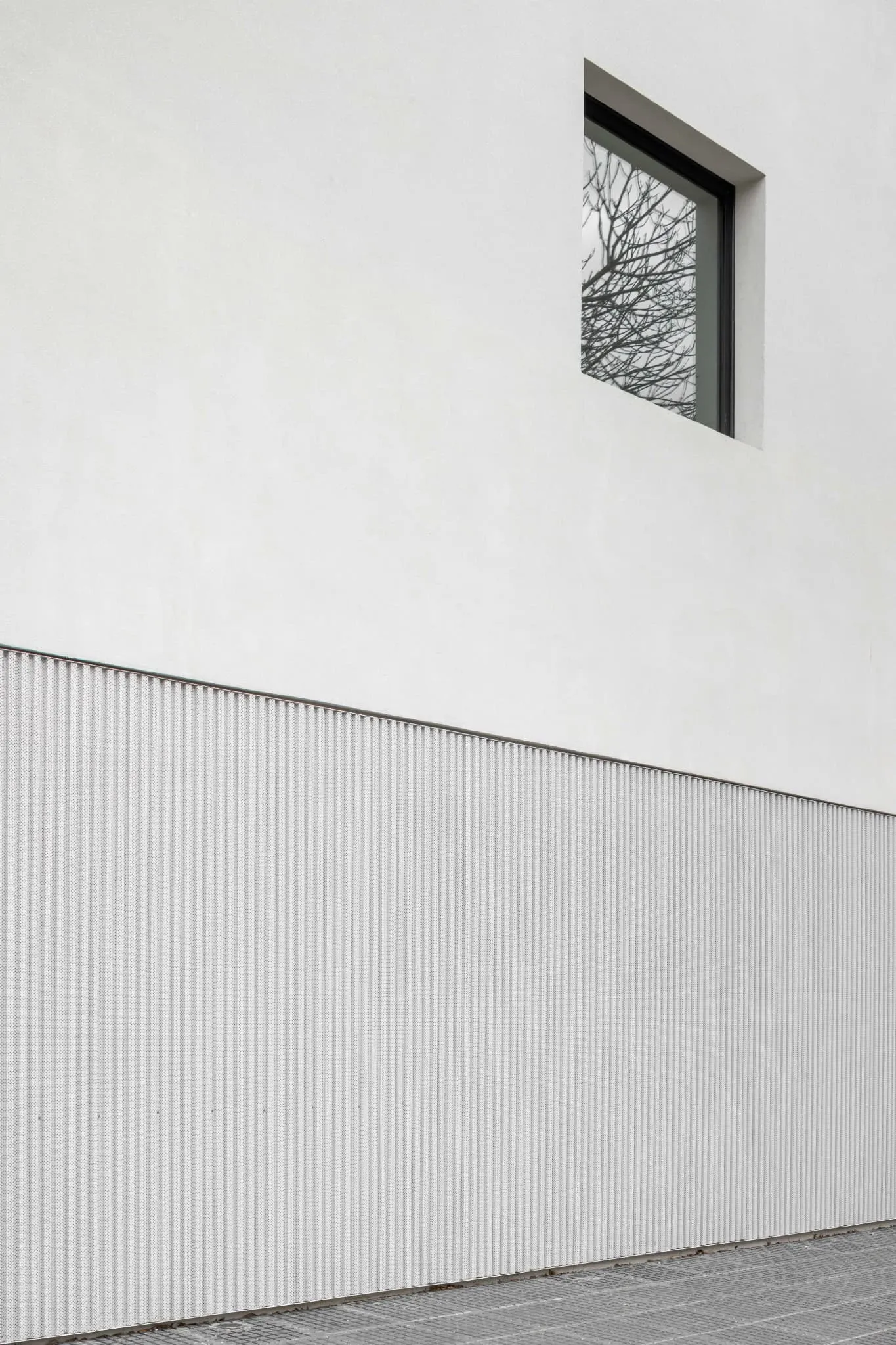 OADD Arquitectos设计的曼努埃拉·佩德拉斯住宅——波纹饰面细节，乌尔基萨区，布宜诺斯艾利斯