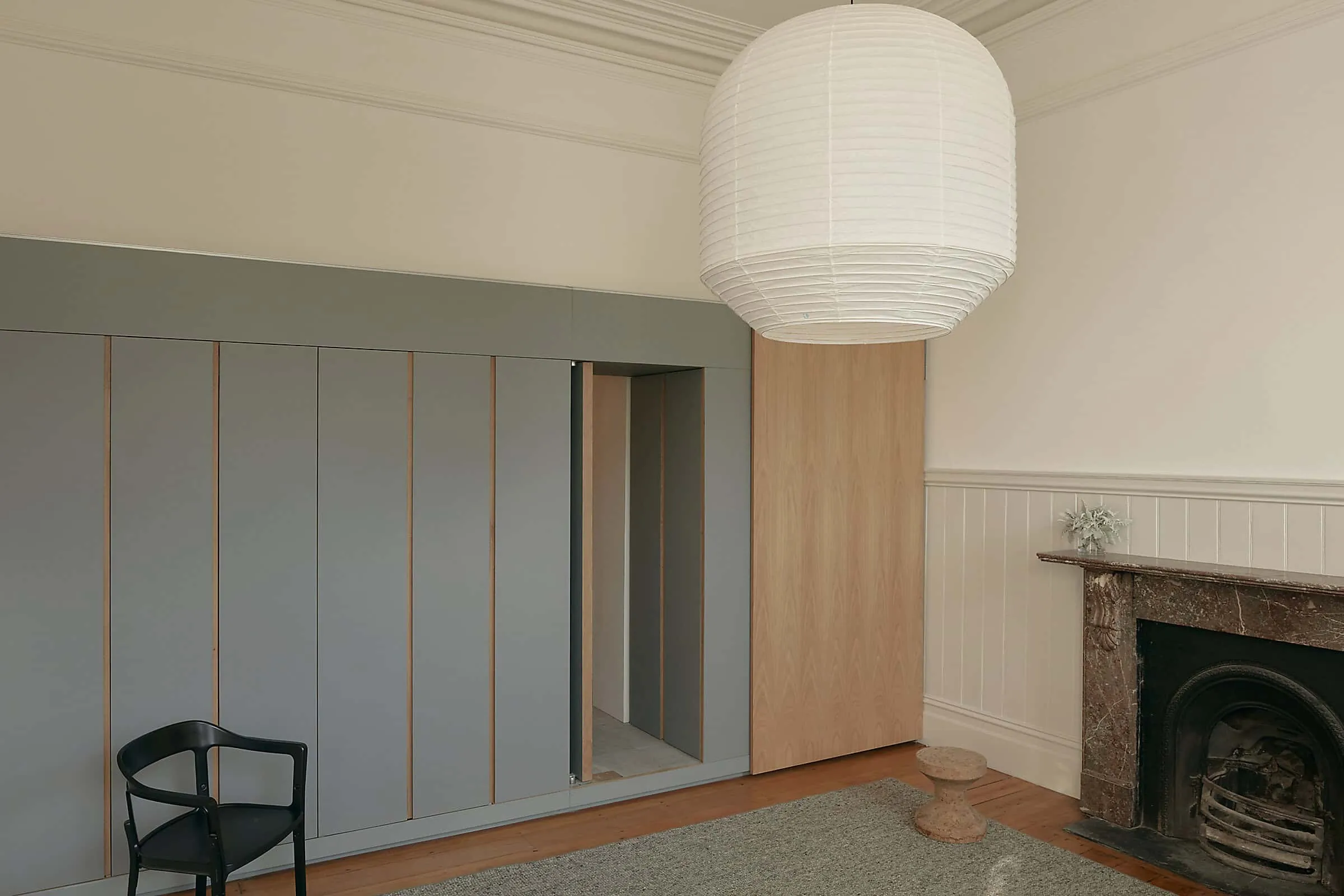 Modern built-in wardrobe with minimalist design in contemporary living space.