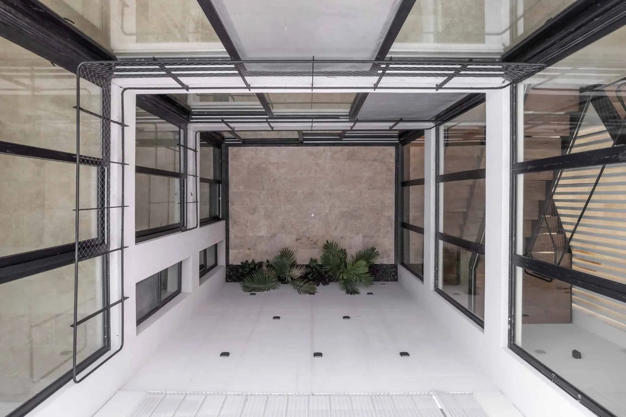 OADD Arquitectos设计的曼努э拉·佩德拉斯住宅——庭院俯视图，乌尔基萨区，布宜诺斯艾利斯