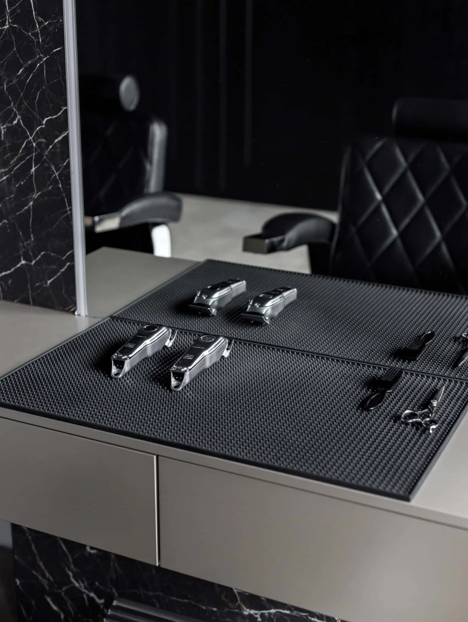 Modern minimalist interior by Julia Starikova – hairdressing counter with tools in Chelyabinsk, Russia