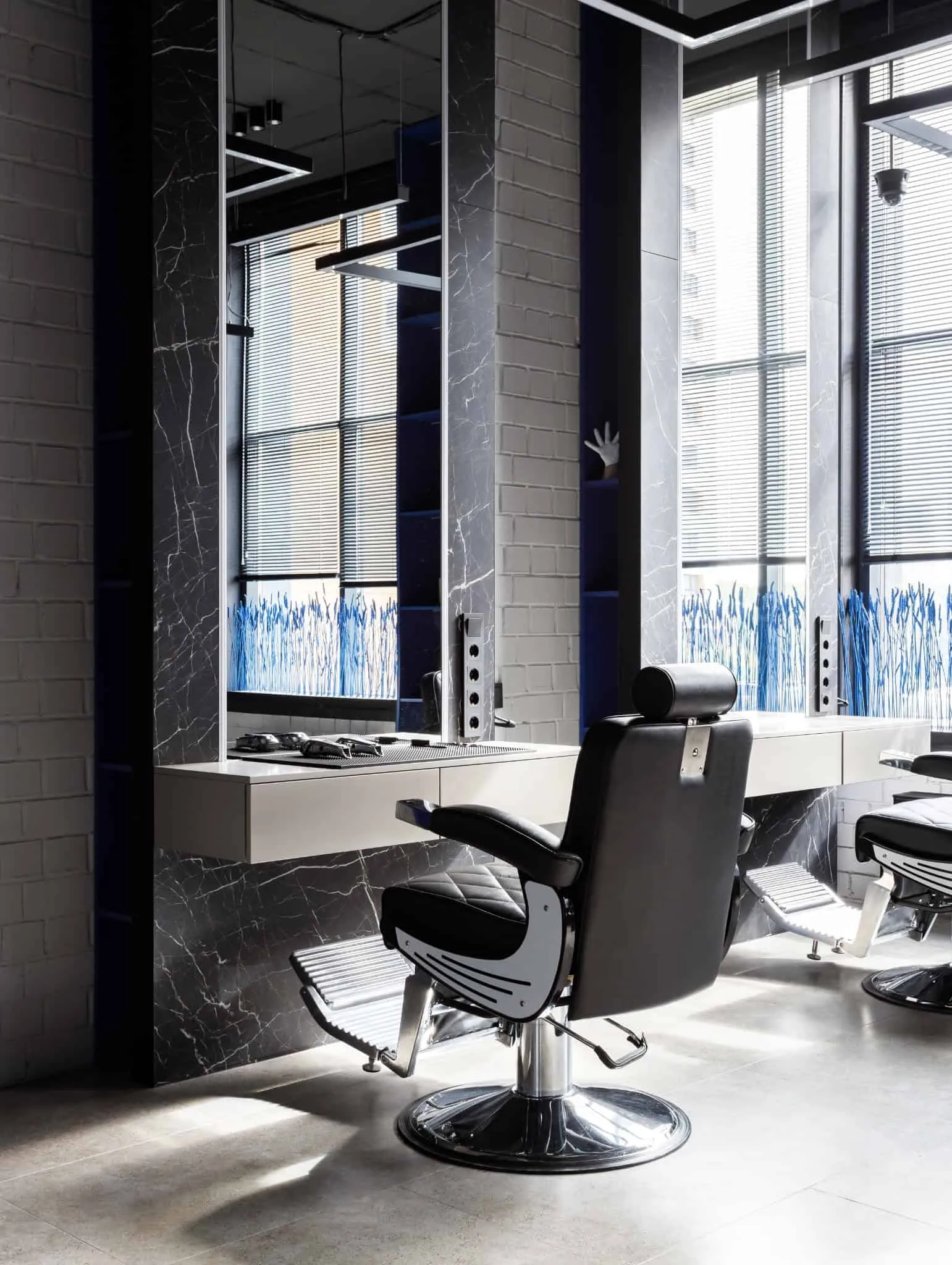 Modern minimalist interior by Julia Starikova – hair styling station near window in Chelyabinsk, Russia