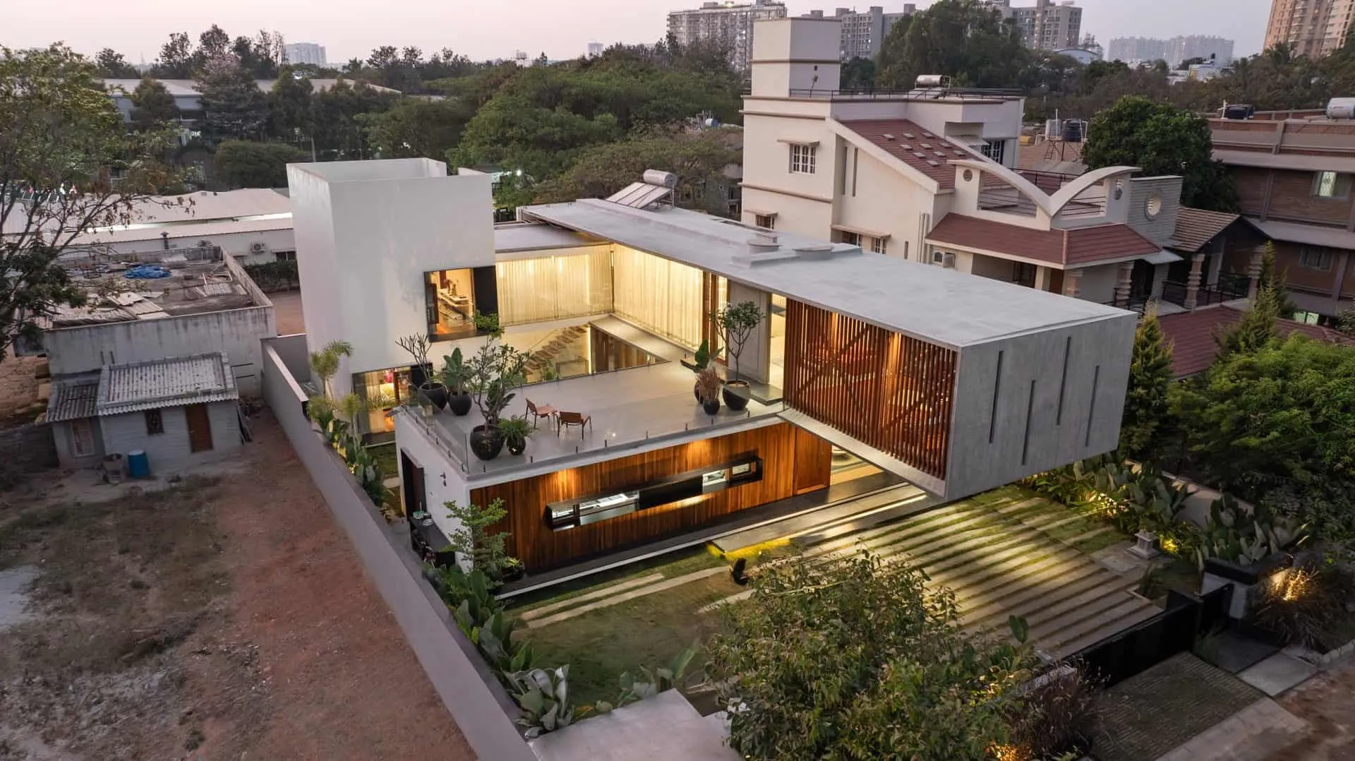 Minimalist House by Crest Architects — top view at evening, Bangalore, India