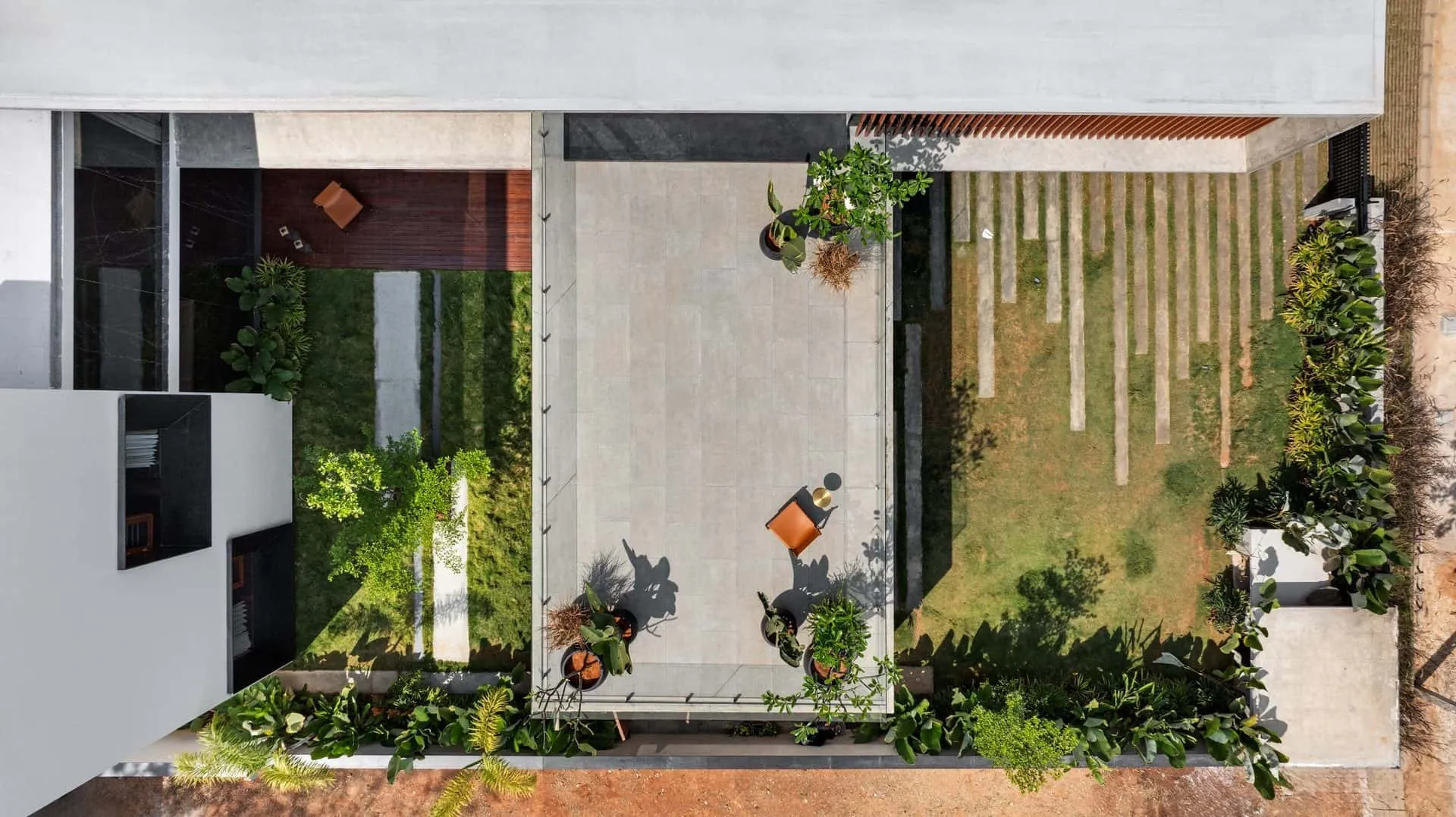 Minimalist House by Crest Architects — top view of inner courtyard and terrace, Bangalore, India