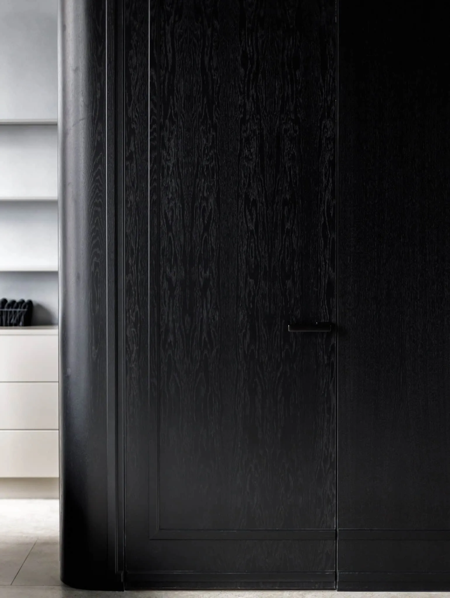 Modern minimalist interior by Julia Starikova – dark wood door in Chelyabinsk, Russia
