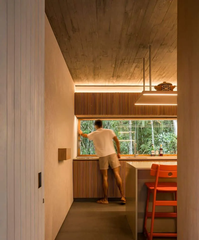 Canopy House by Studio MK27 – kitchen window counter facing the forest, Guarujá, Brazil