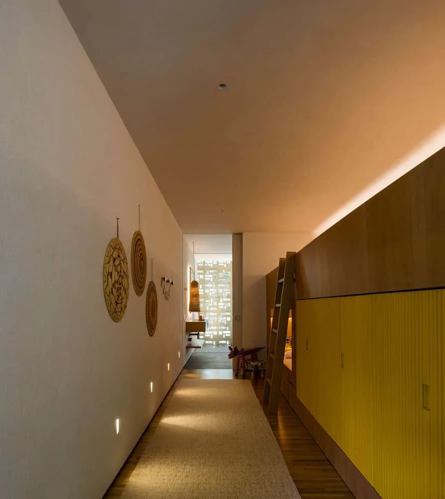 Canopy House by Studio MK27 – corridor with yellow cabinets, Guarujá, Brazil