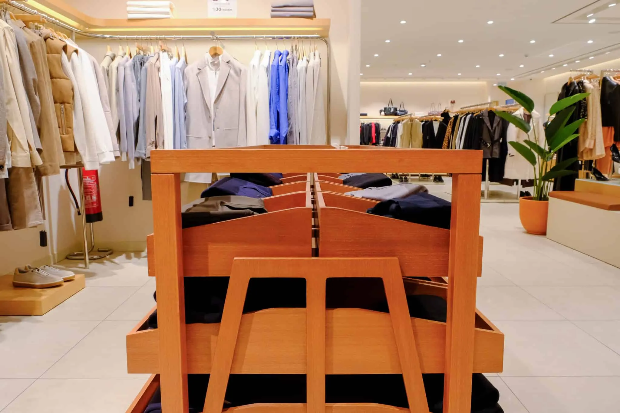 Details of trouser rack of NetWork Stores by Boytorun Architects in Turkey