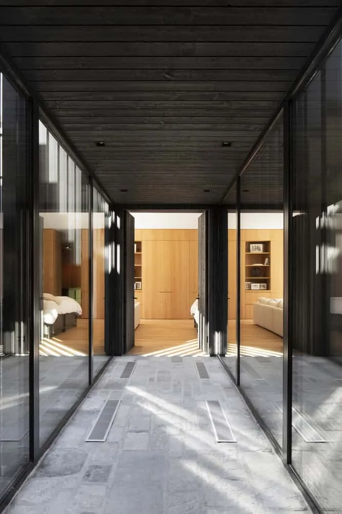 Wooden staircase details inside the La Baie de l'Ours house