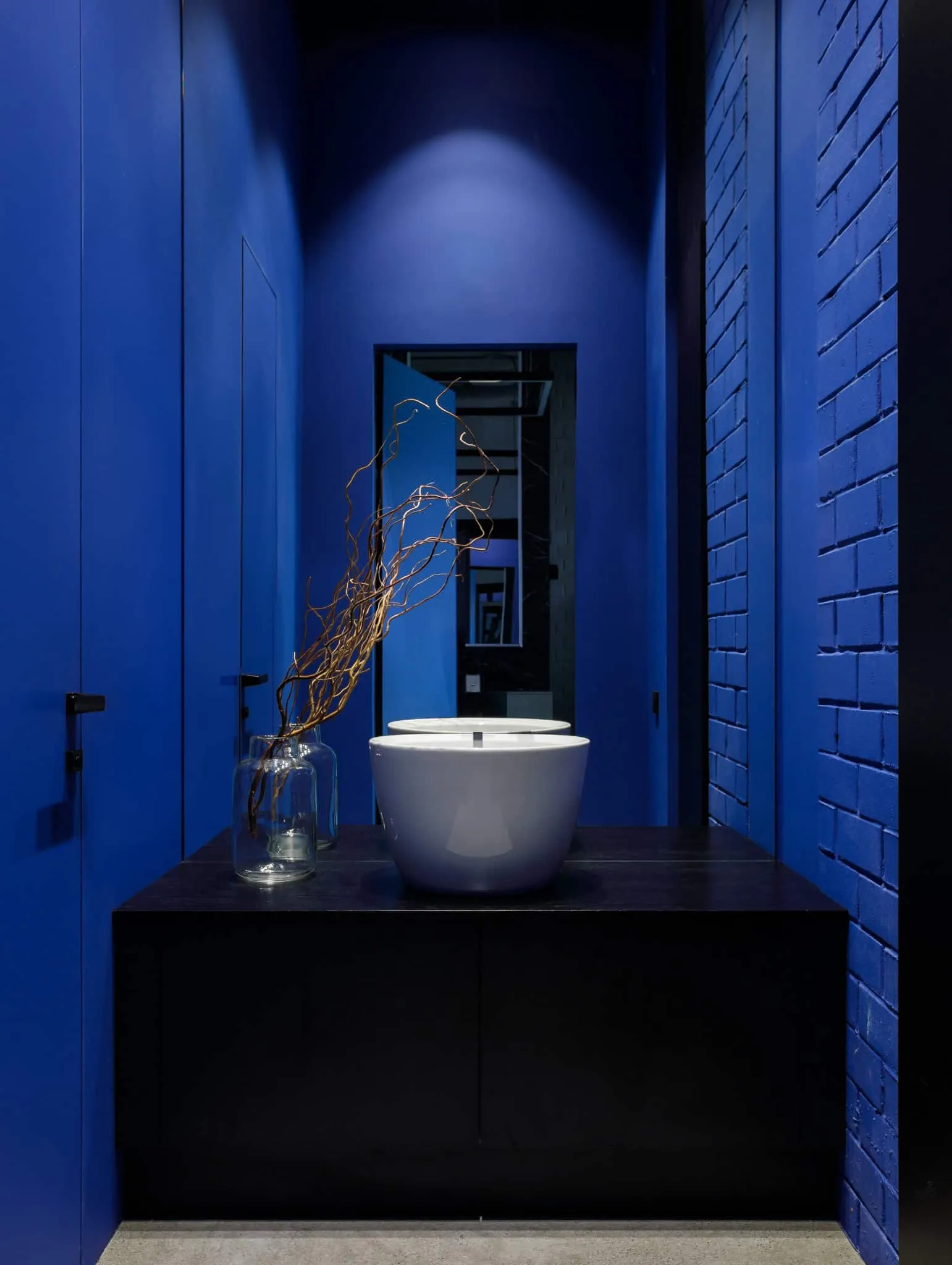 Modern minimalist interior by Julia Starikova – corridor view with blue door in Chelyabinsk, Russia