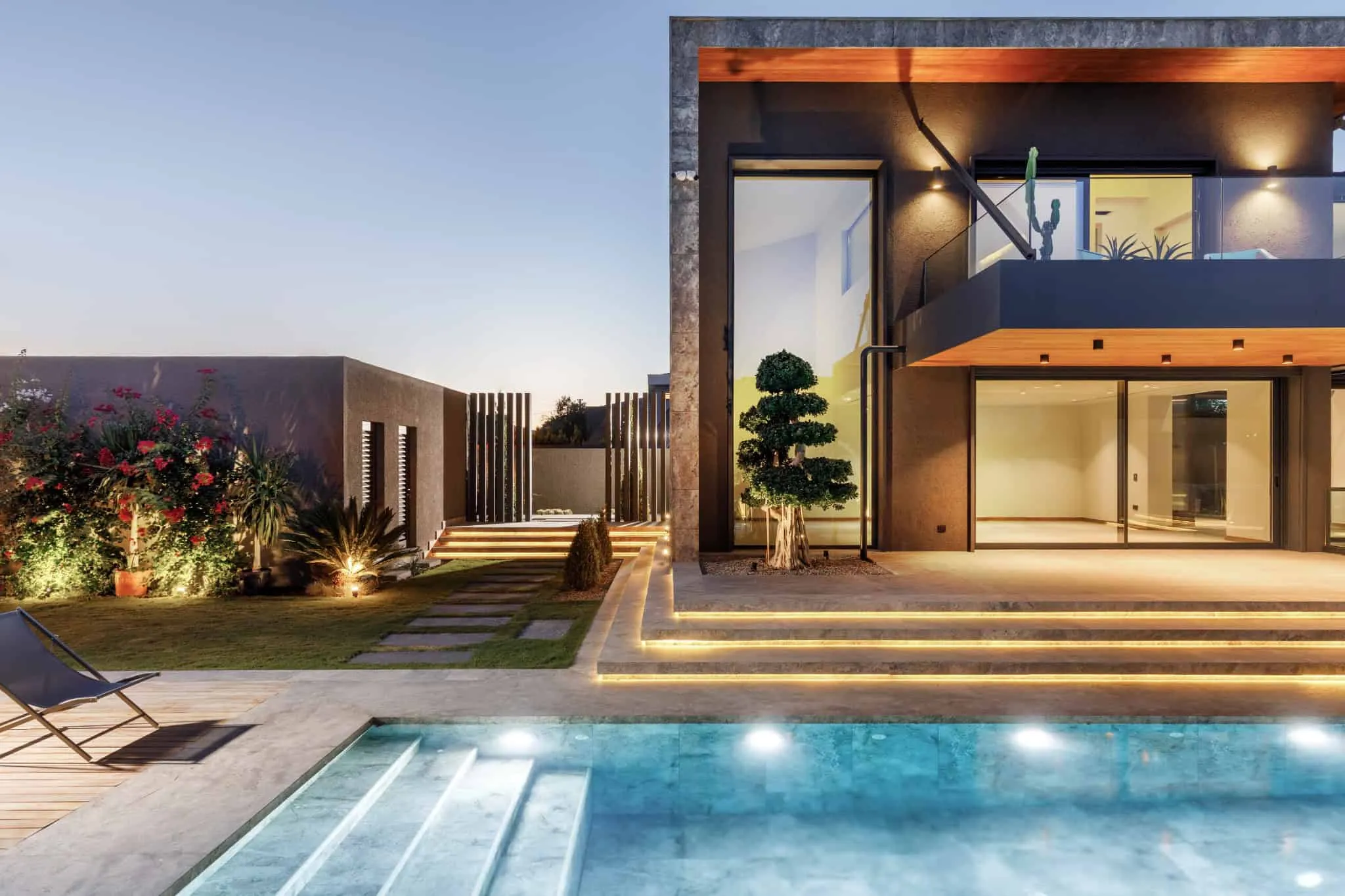 Casa Pendenza facade at dusk by BAD – Başak Akkoyunlu Design in Mamurbaba, Çeşme, İzmir