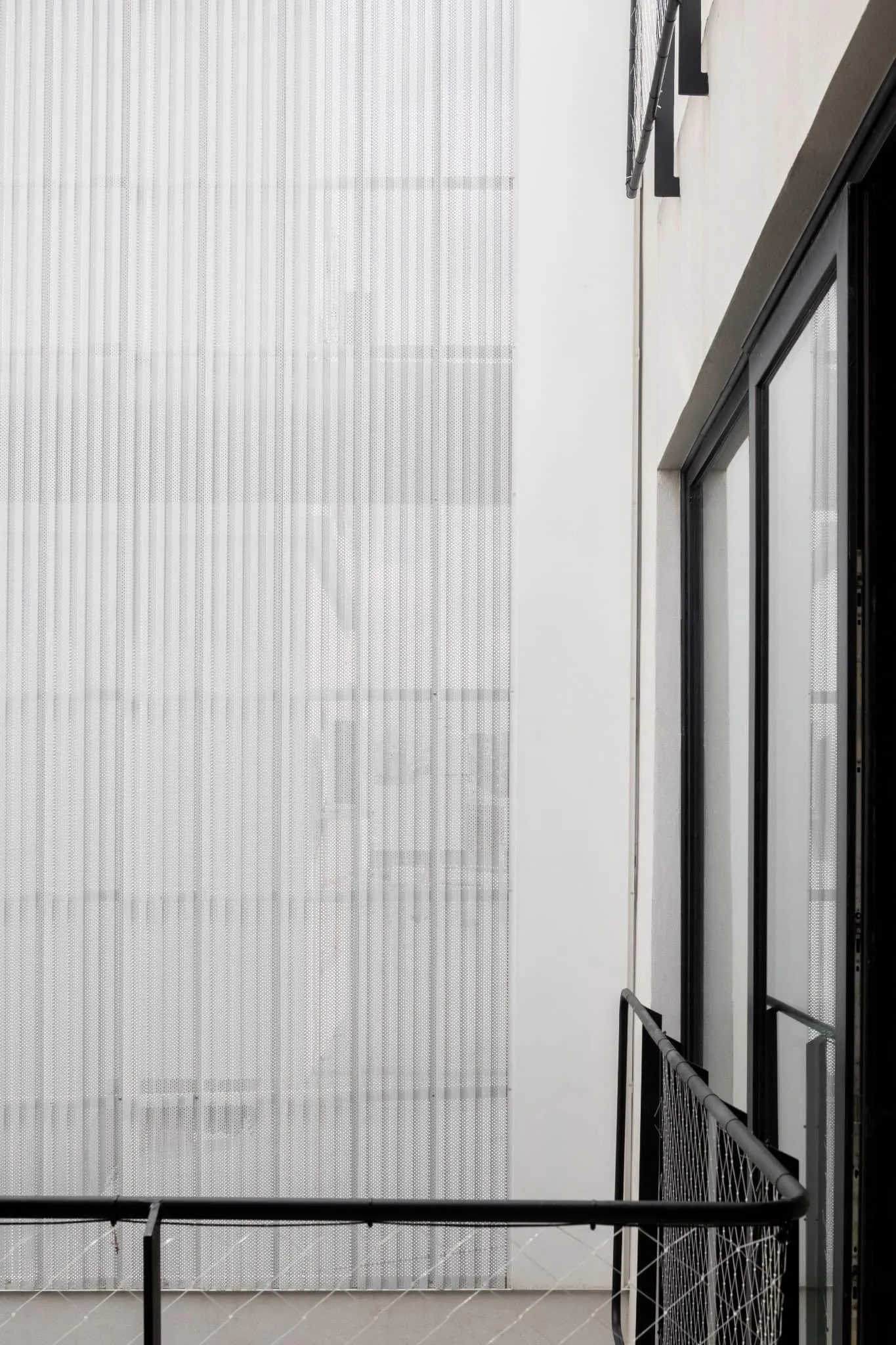 OADD Arquitectos设计的曼努э拉·佩德拉斯住宅——穿孔格栅细节，乌尔基萨区，布宜诺斯艾利斯