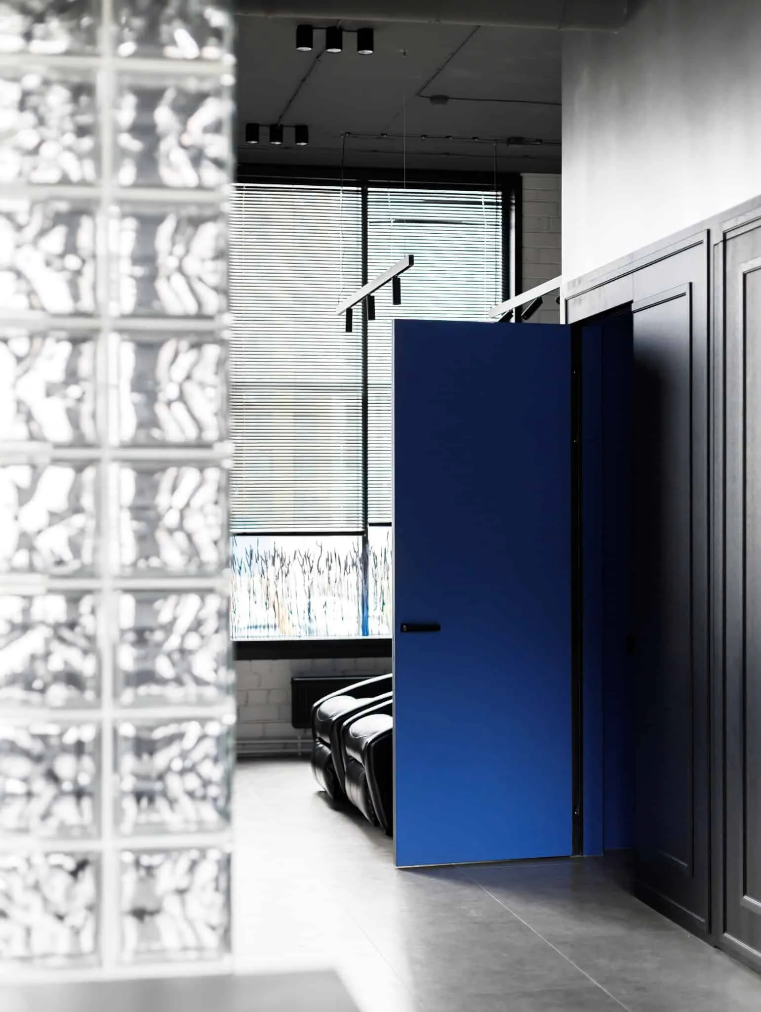 Modern minimalist interior by Julia Starikova – corridor with blue door in Chelyabinsk, Russia