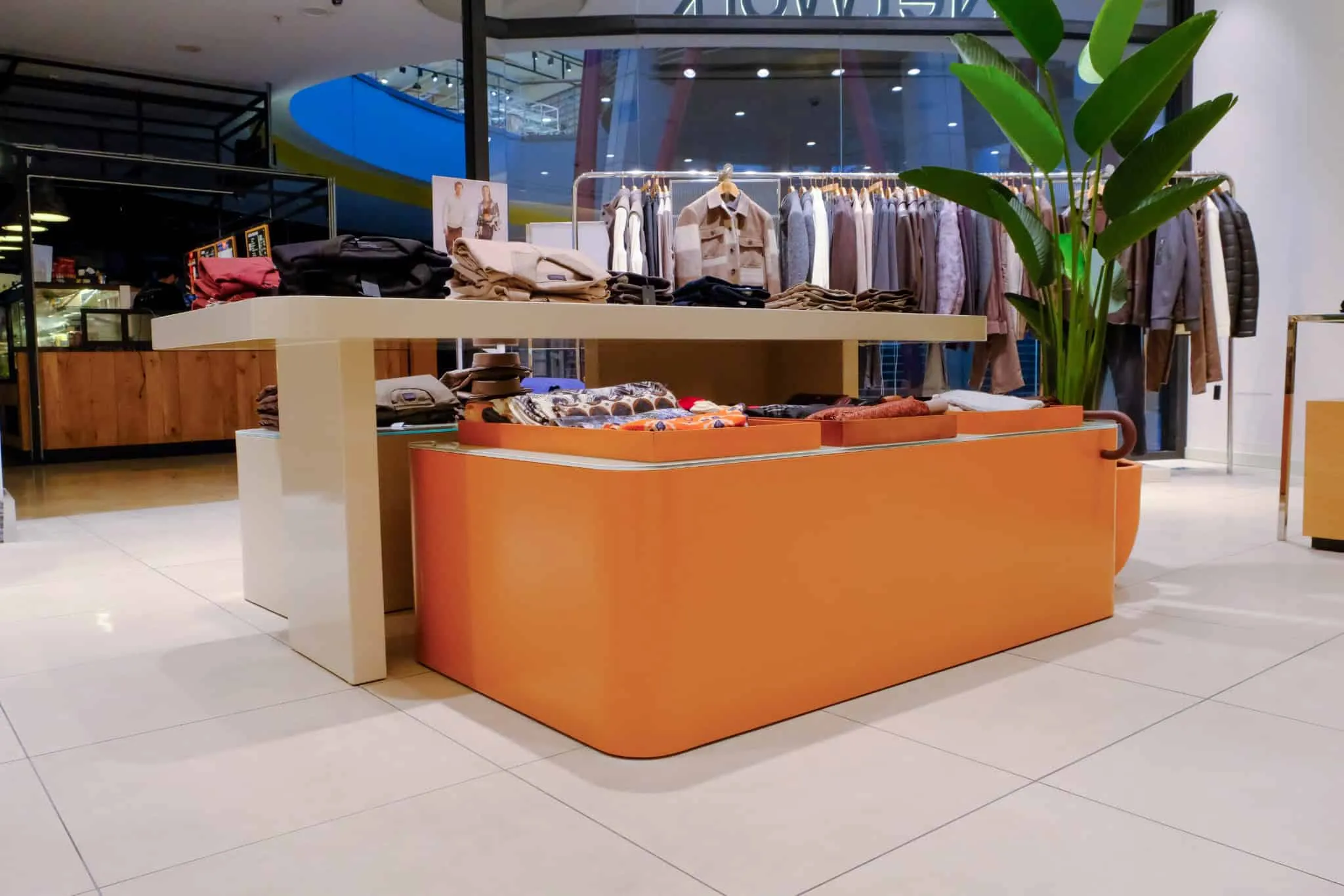 Orange display window of NetWork Stores by Boytorun Architects in Turkey